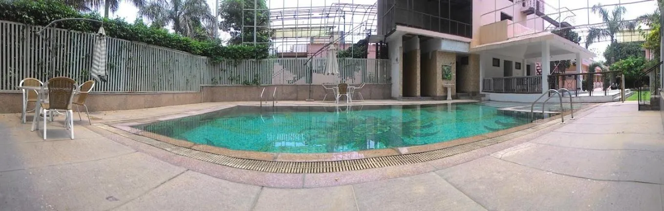 Swimming pool in The Nikunj Hotels