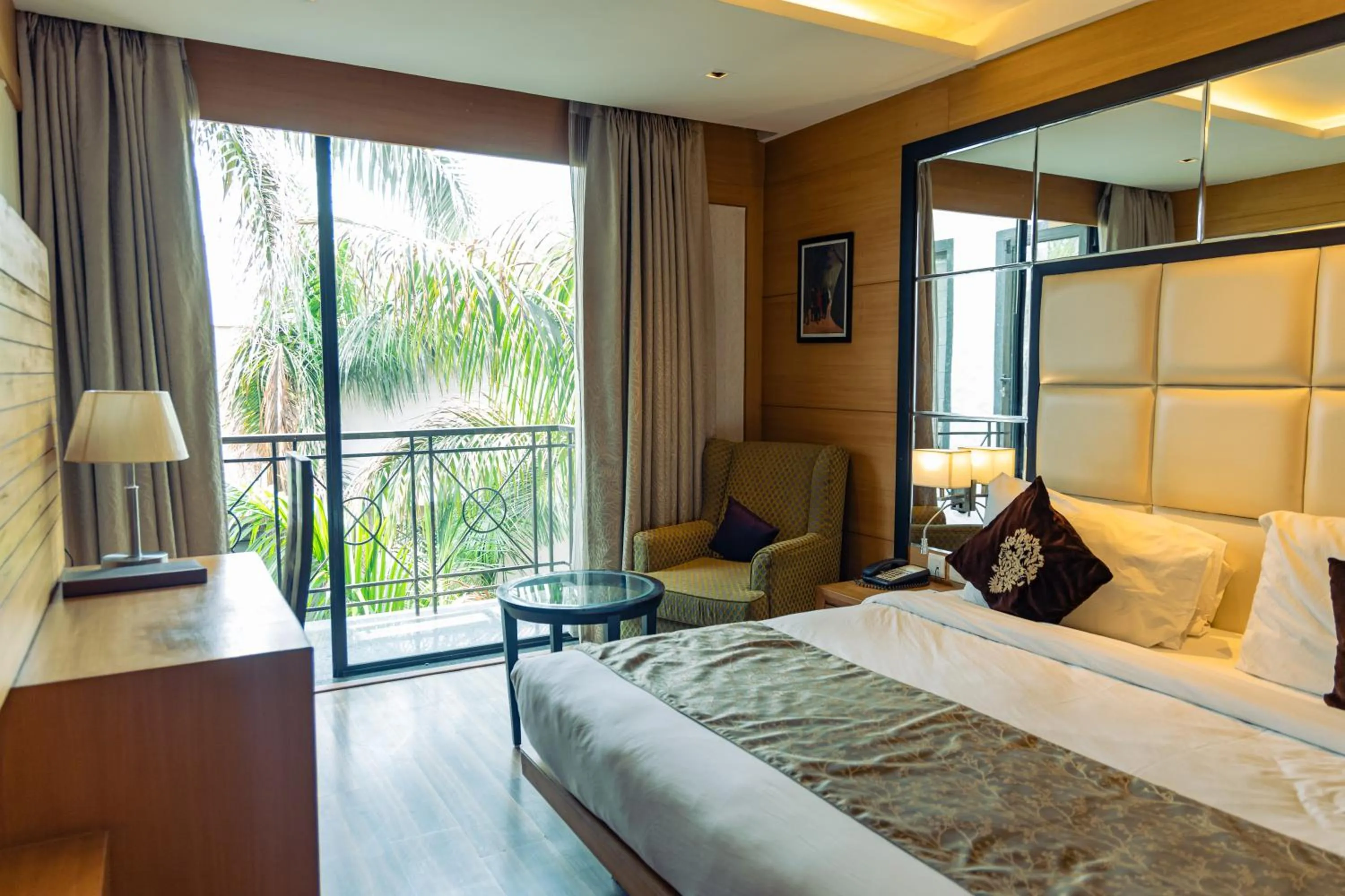 Bed in The Nikunj Hotels