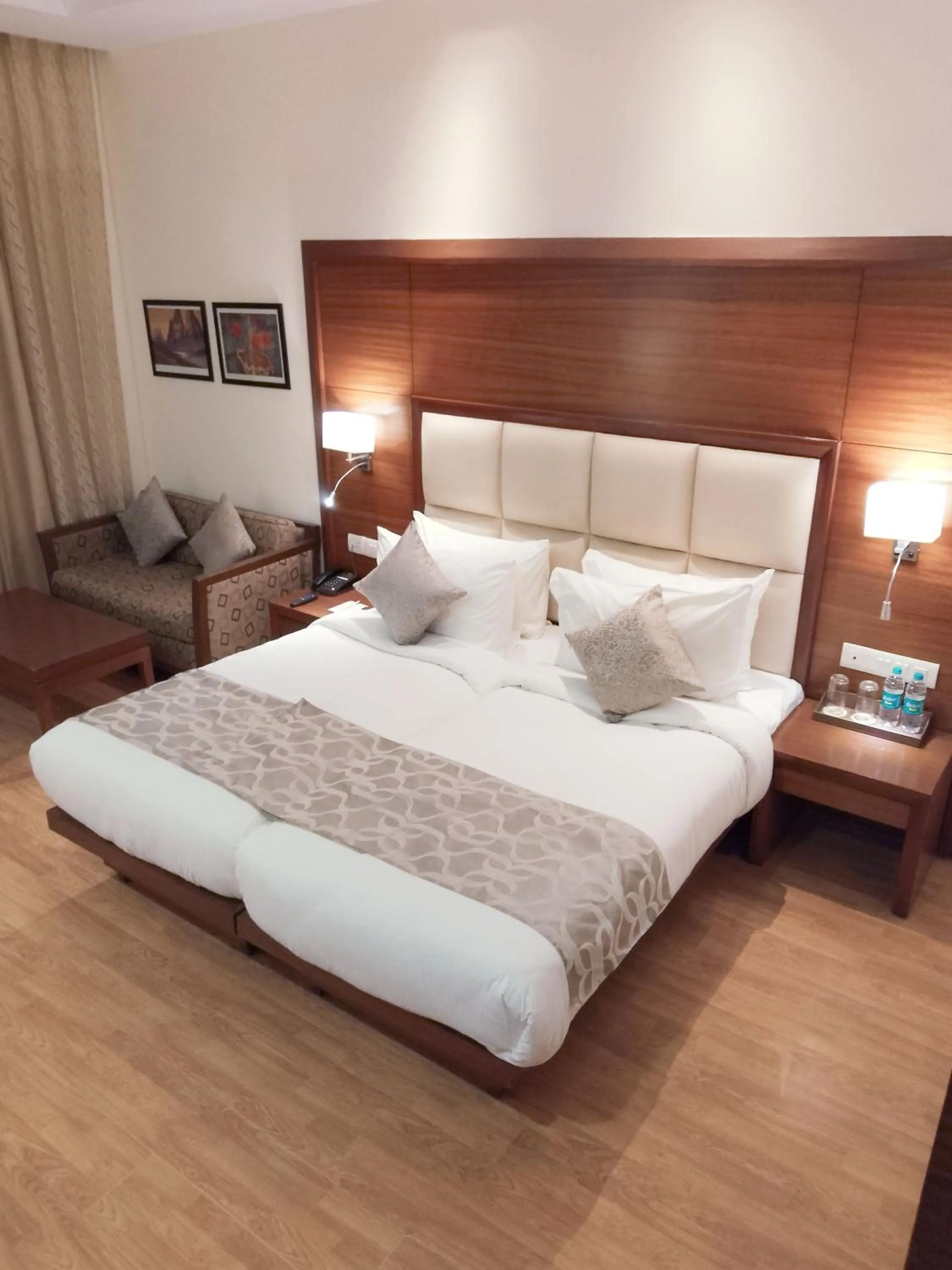 Bedroom, Bed in The Nikunj Hotels