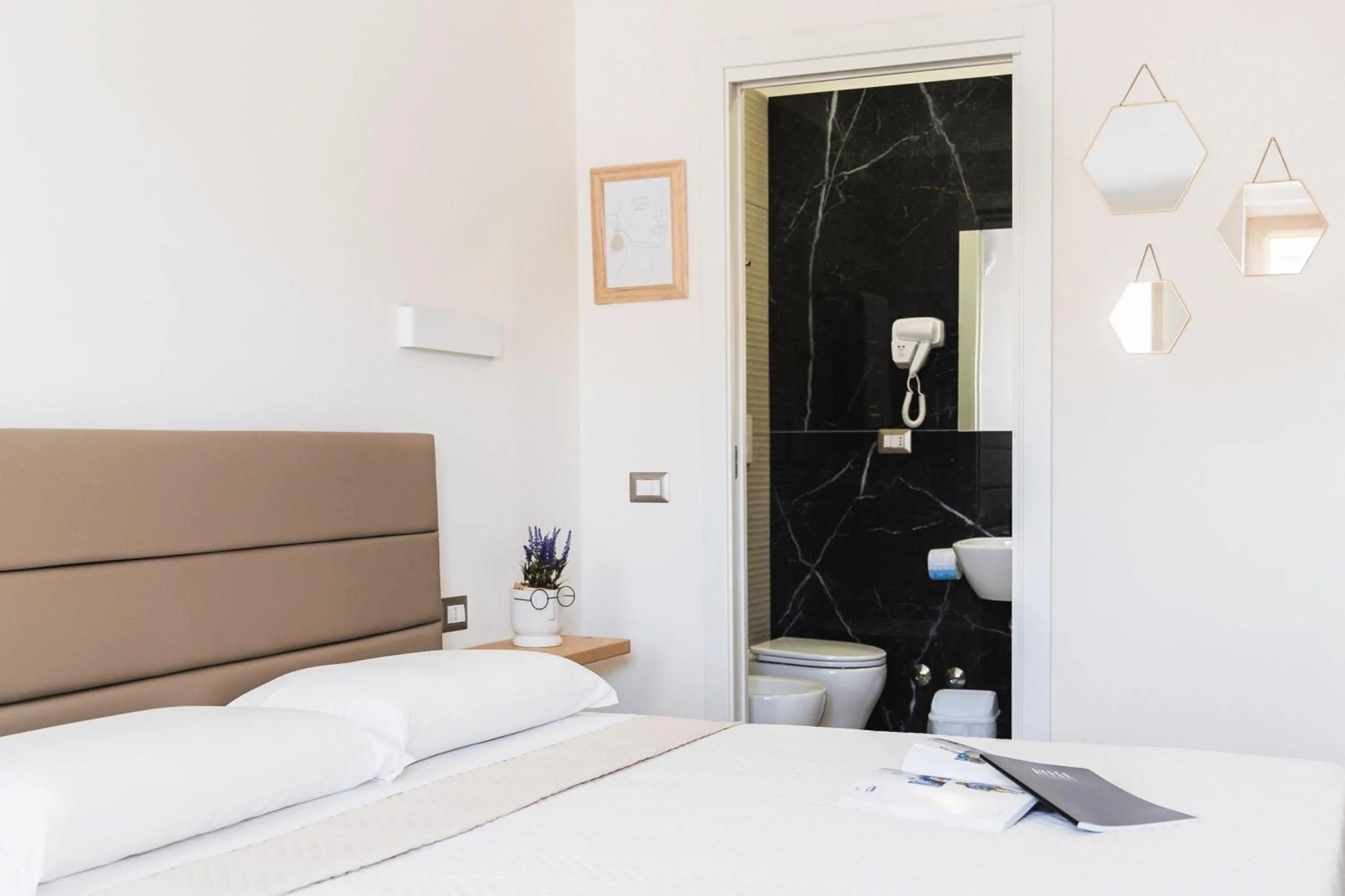 Bed in Art Boutique Rooms