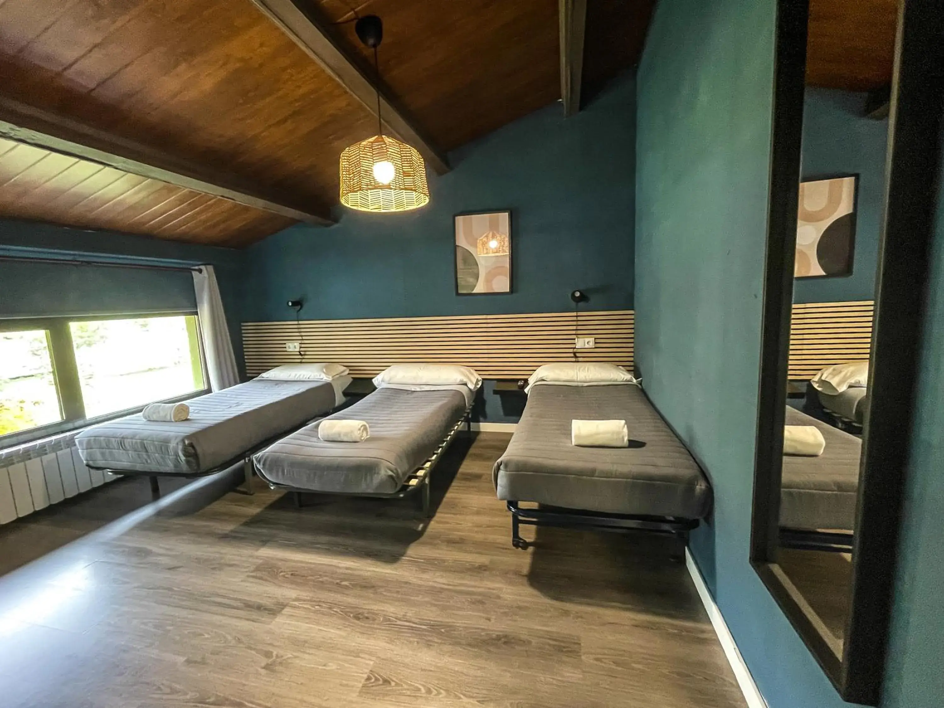 Classic Triple Room in SOLOPUENT Hotel Rural Classic Triple Room in SOLOPUENT Hotel Rural