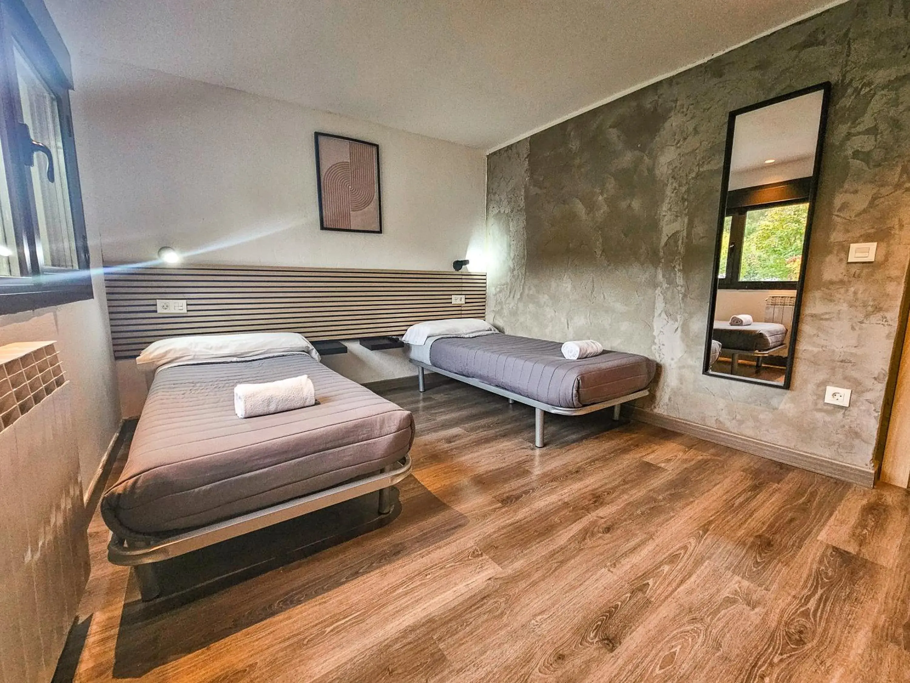 Quadruple Room in SOLOPUENT Hotel Rural Quadruple Room in SOLOPUENT Hotel Rural