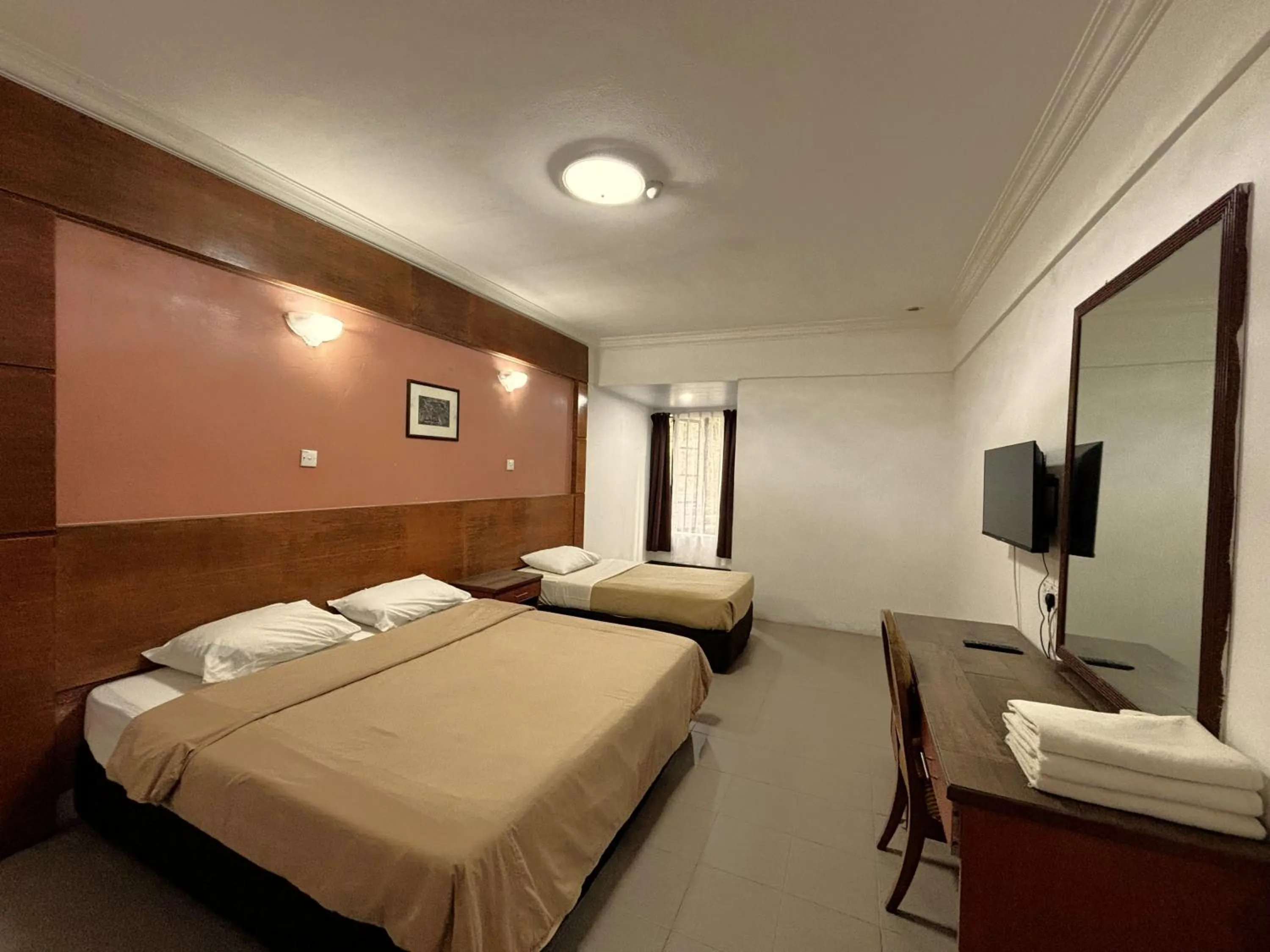 Bed in Cool Point Hotel