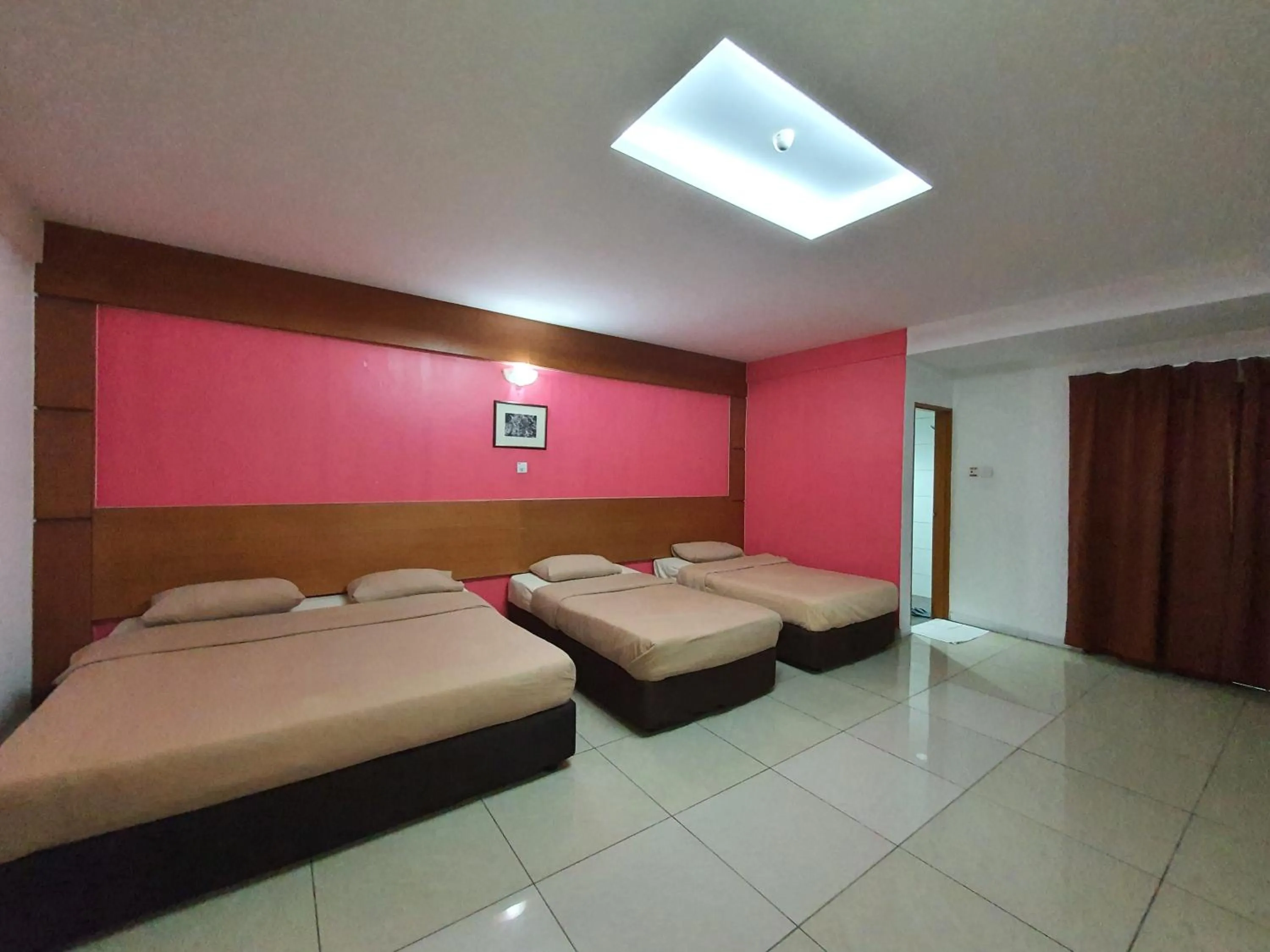 Bed in Cool Point Hotel