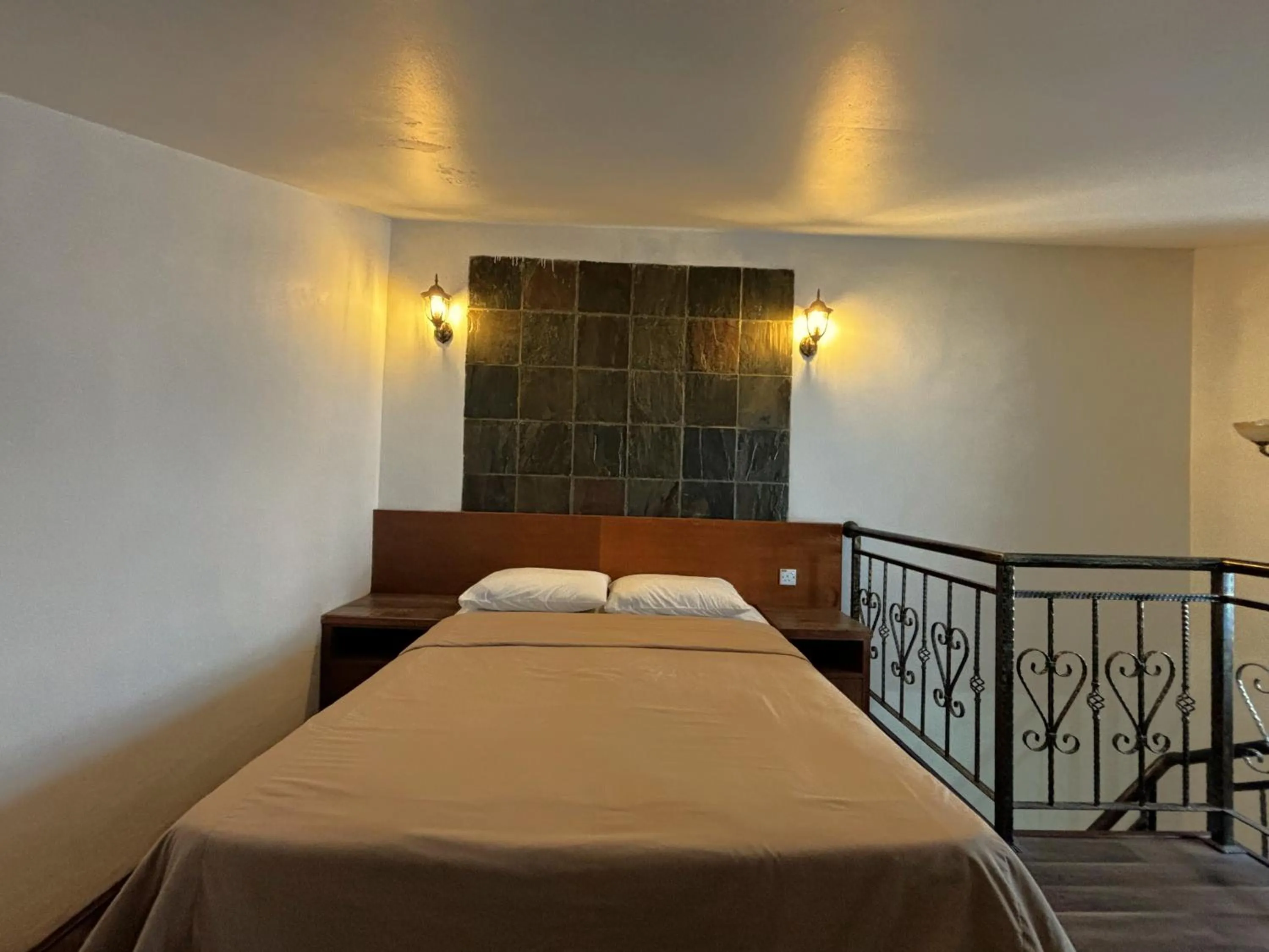 Bed in Cool Point Hotel