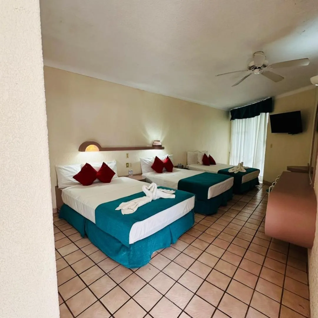 Bed in Hotel Hacienda del Rio Oaxtepec