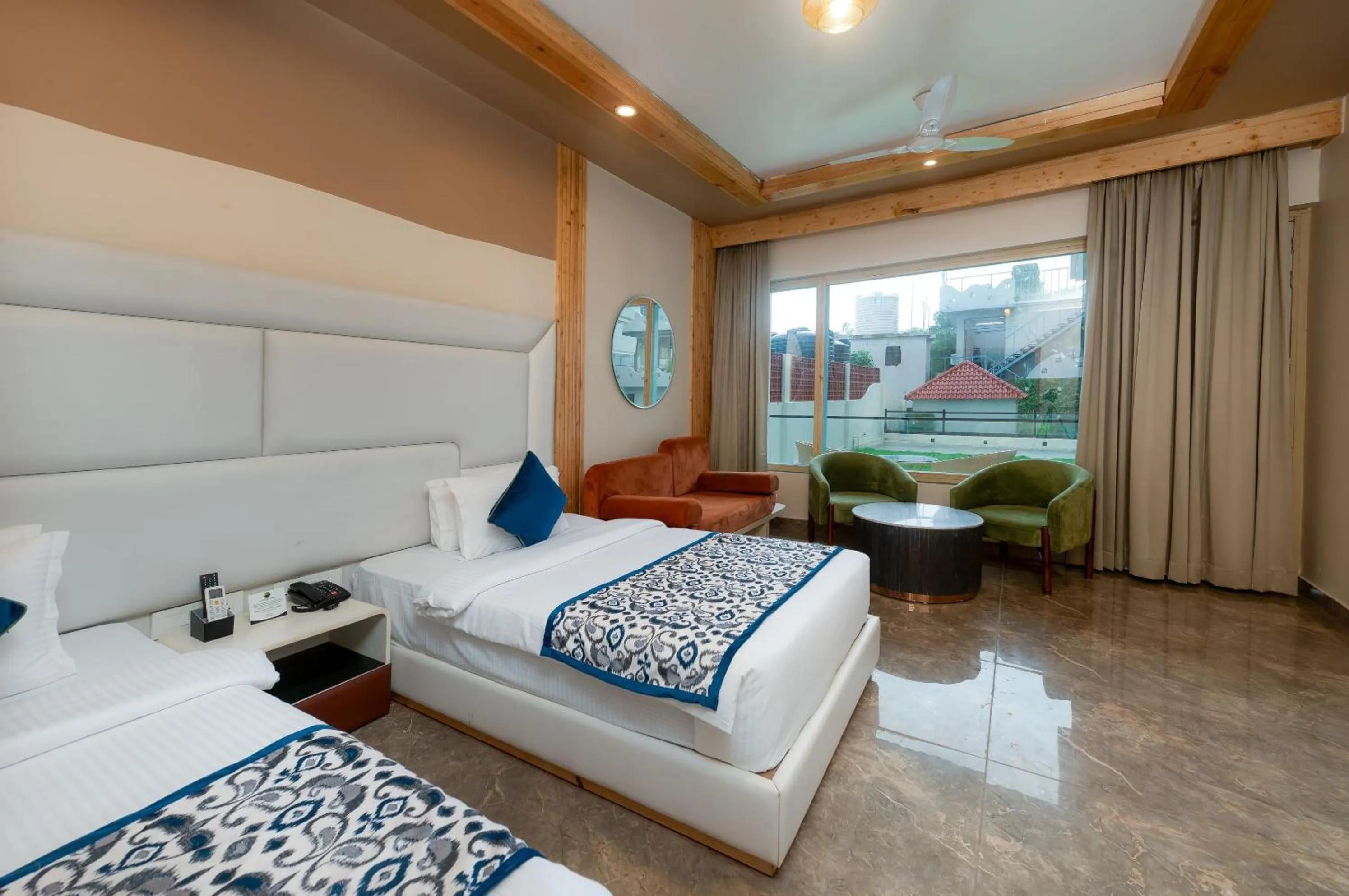 View (from property/room), Bed in Grand Continent Morjim