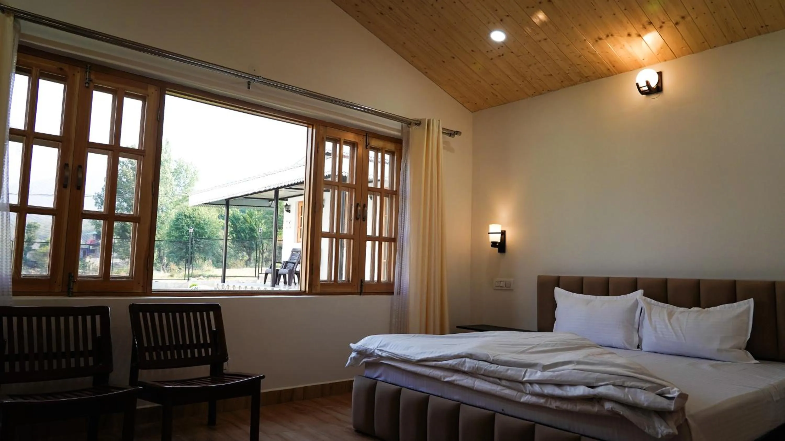 Bed in Saanjh Cottages