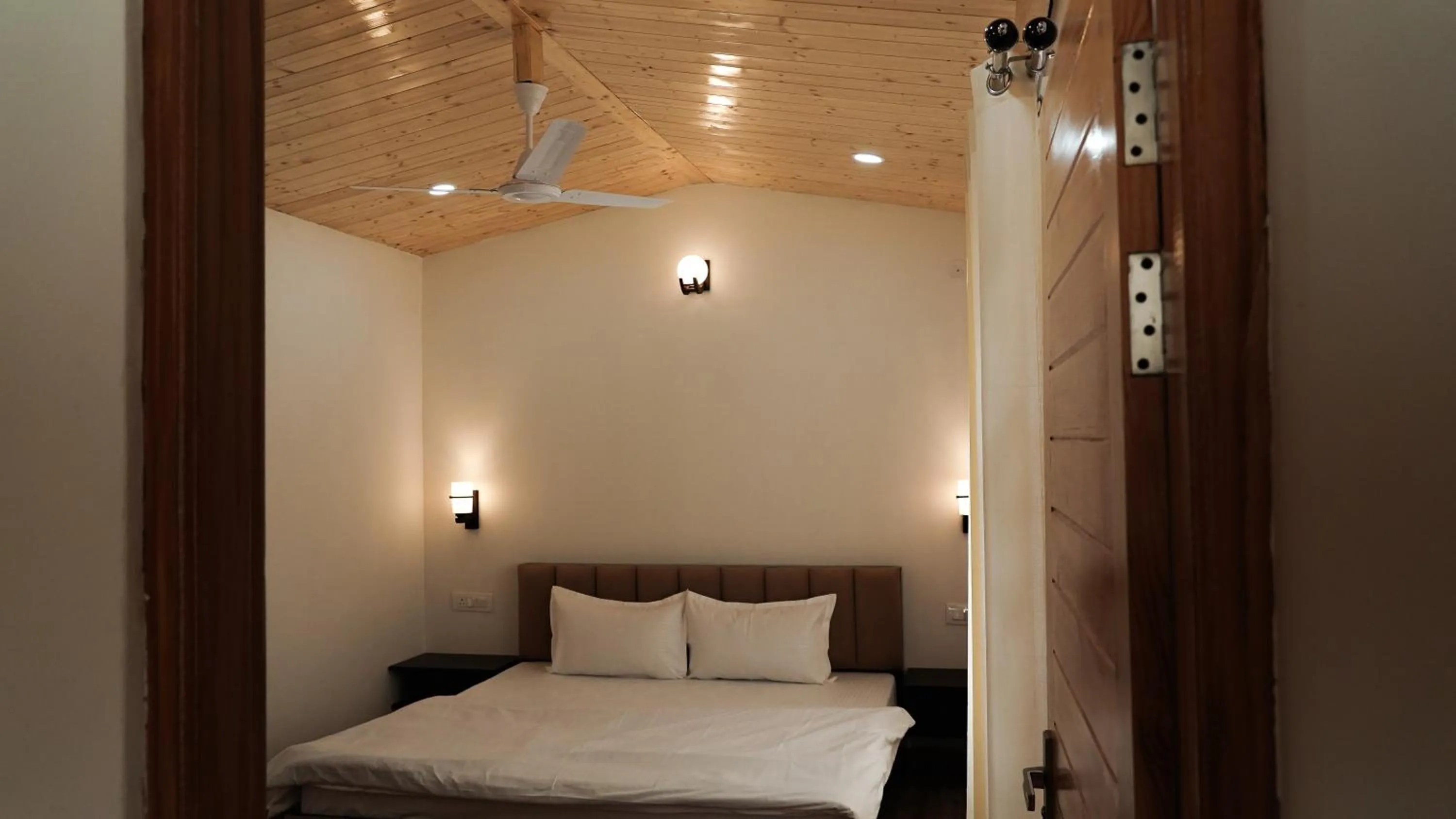 Bed in Saanjh Cottages