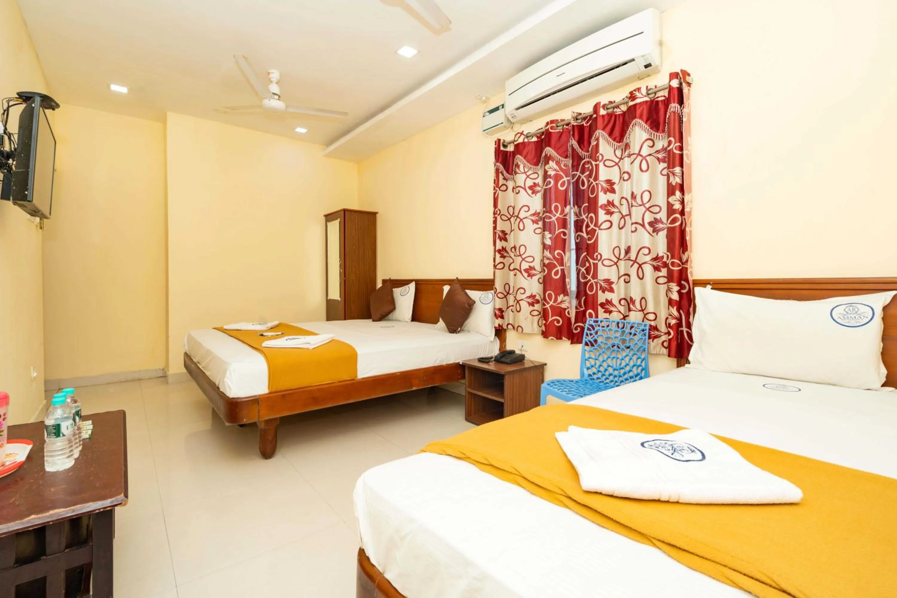 Photo of the whole room, Bed in Amman Residency - Rameswaram