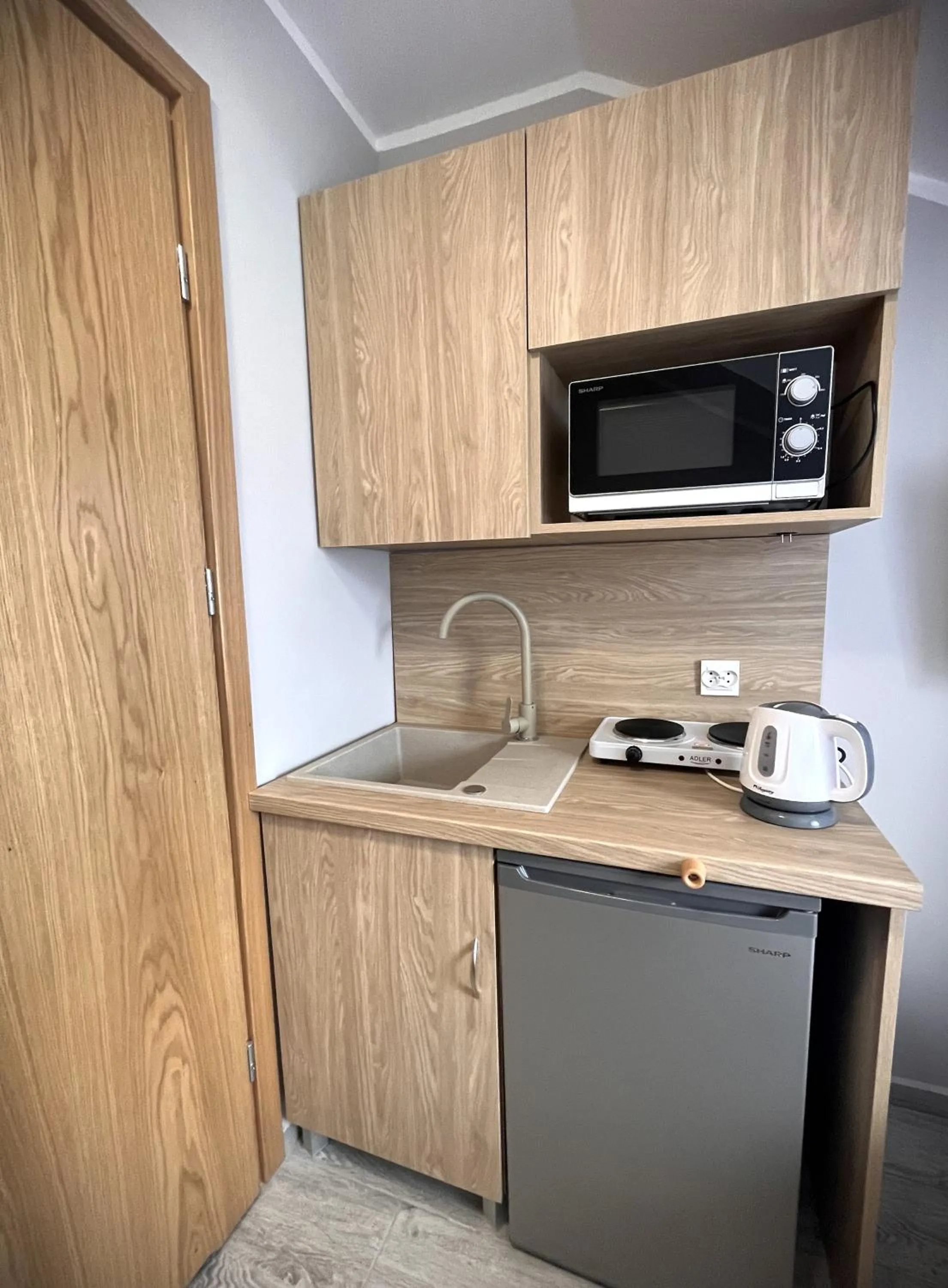 Kitchen or kitchenette in Apartamenty Wilczyńskiego