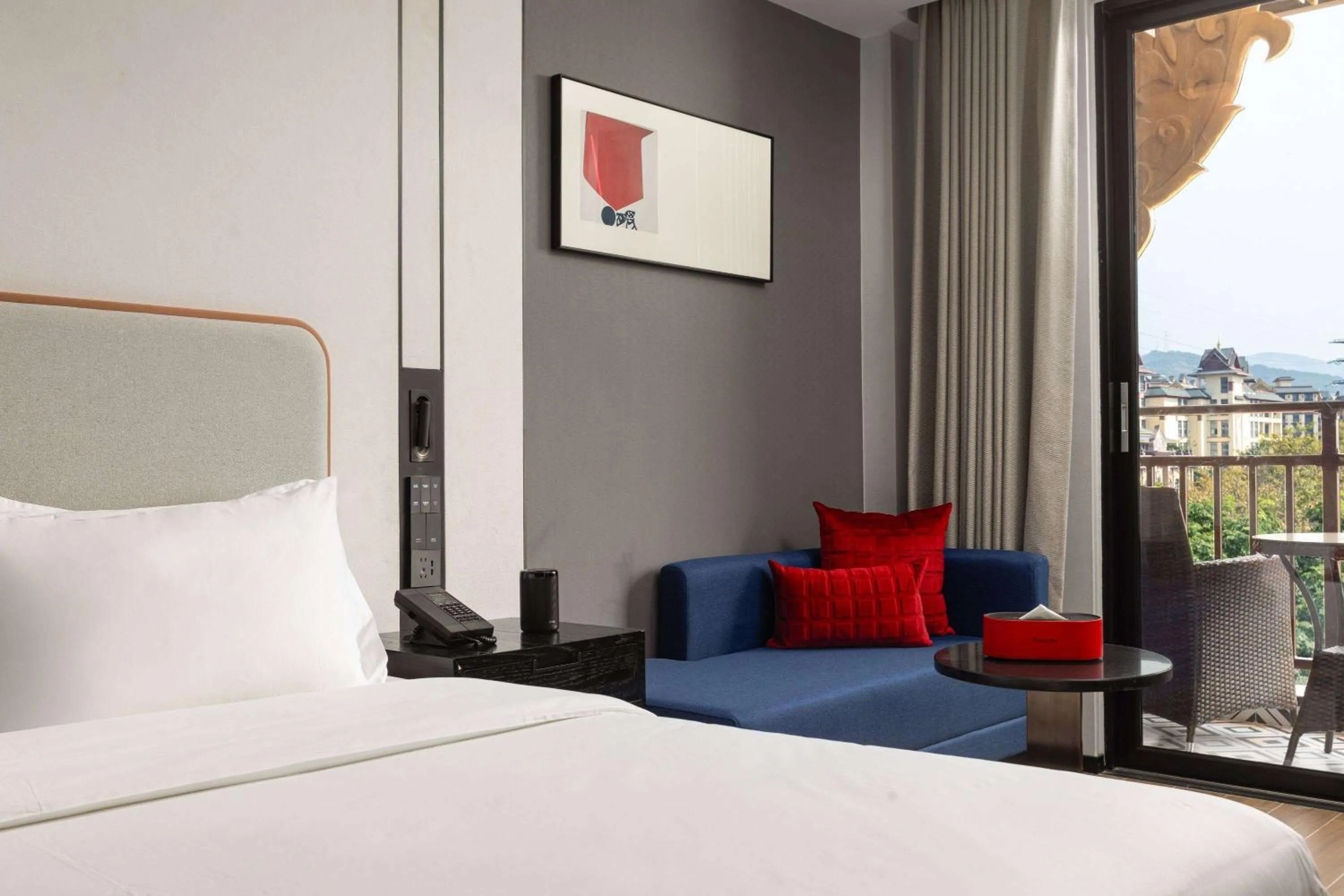 Photo of the whole room in Ramada by Wyndham Xishuangbanna Jinghong