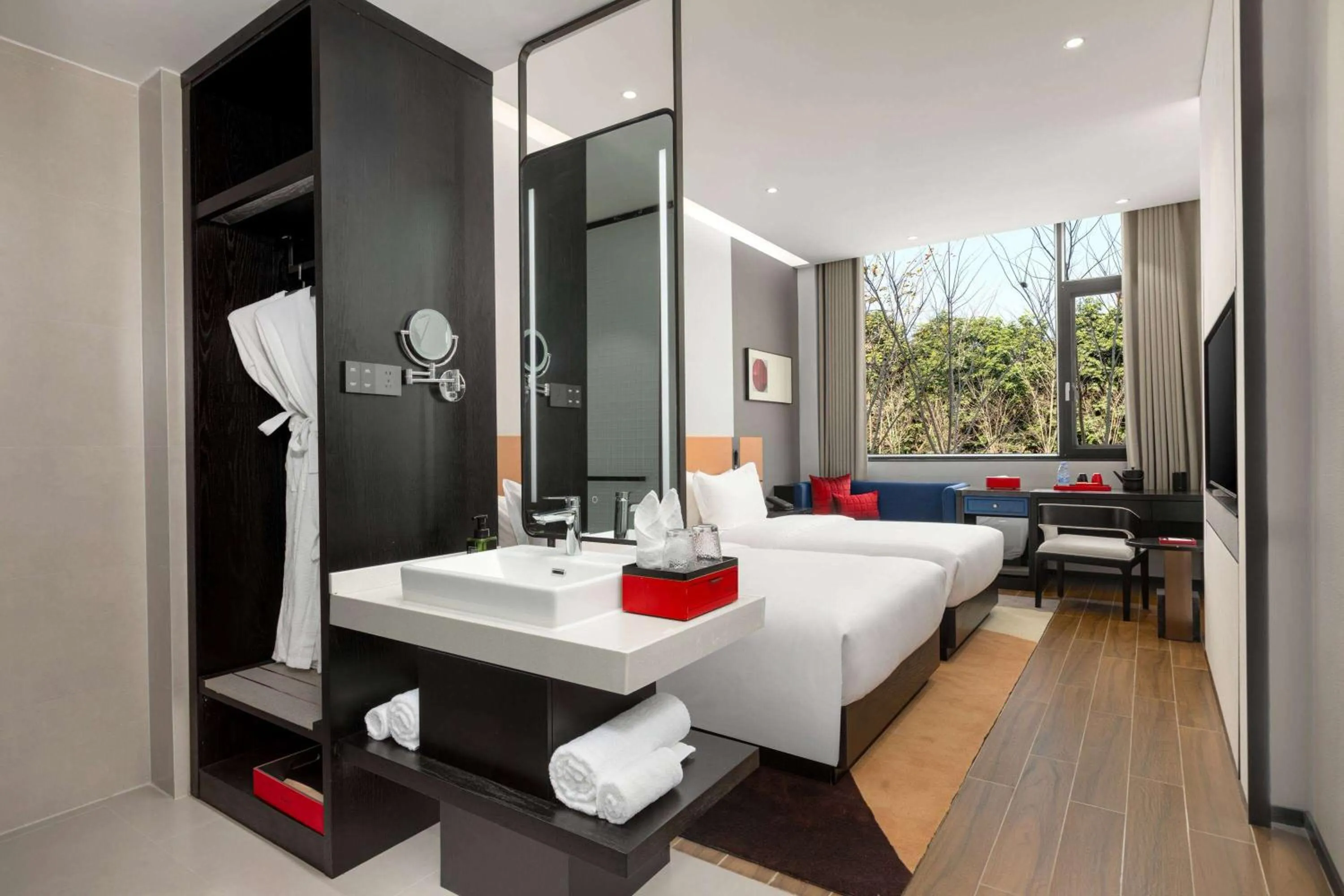 Photo of the whole room in Ramada by Wyndham Xishuangbanna Jinghong