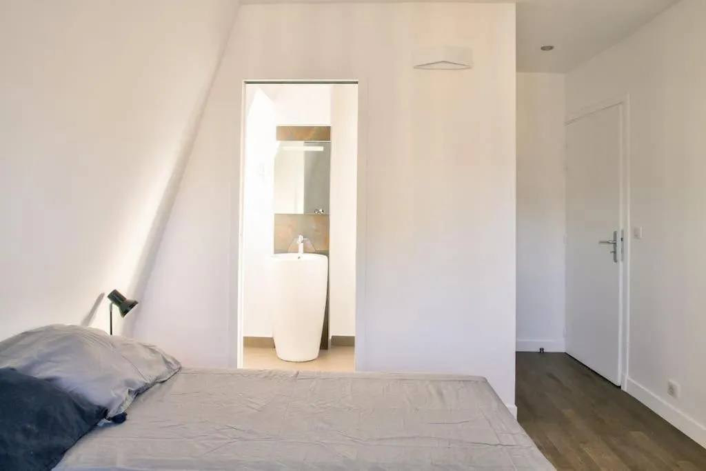 Bedroom in Super logement cosy avec vue sur Tour Eiffel
