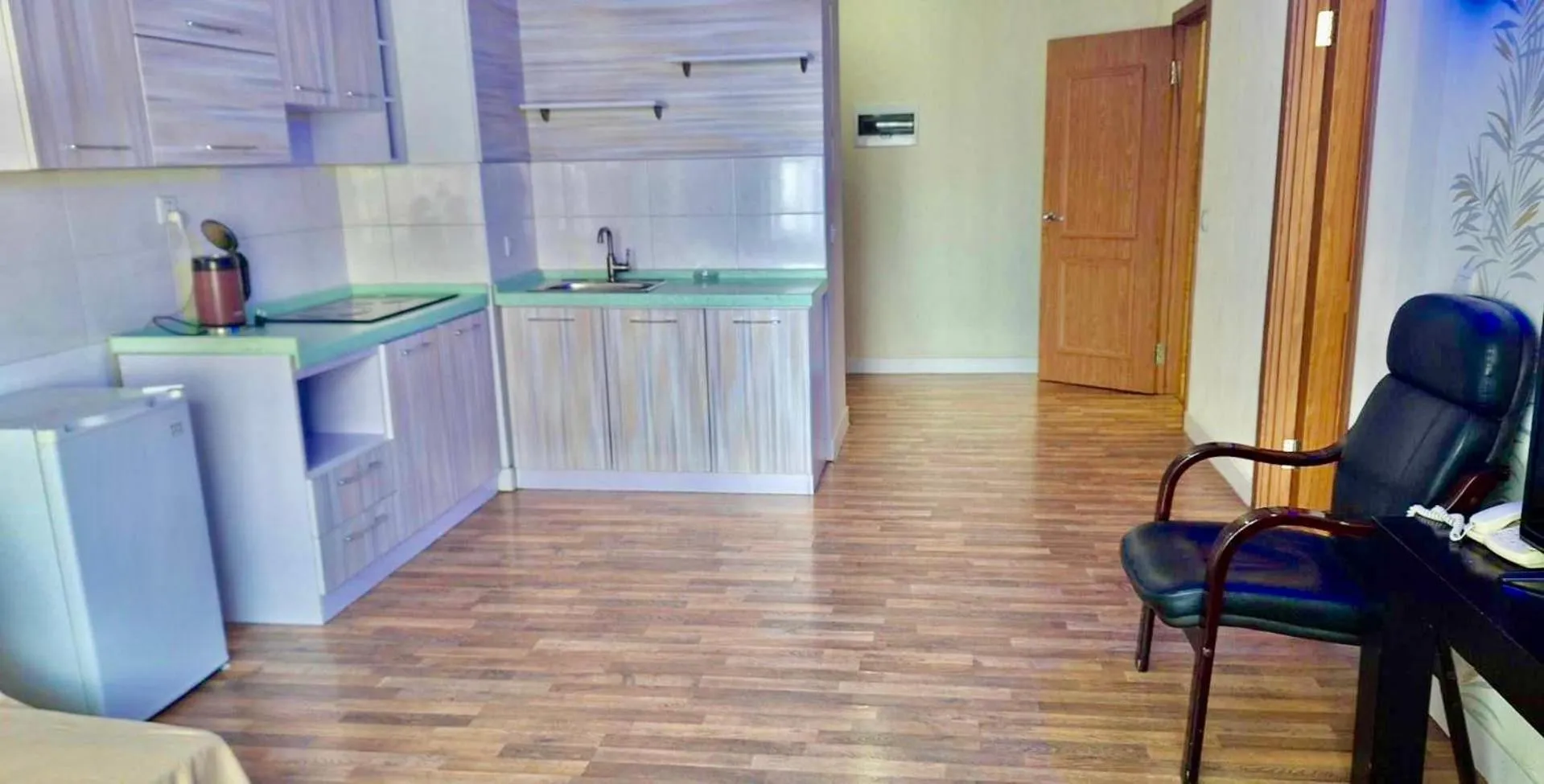 Kitchen or kitchenette in Negdelchin Hotel & Service Apartment