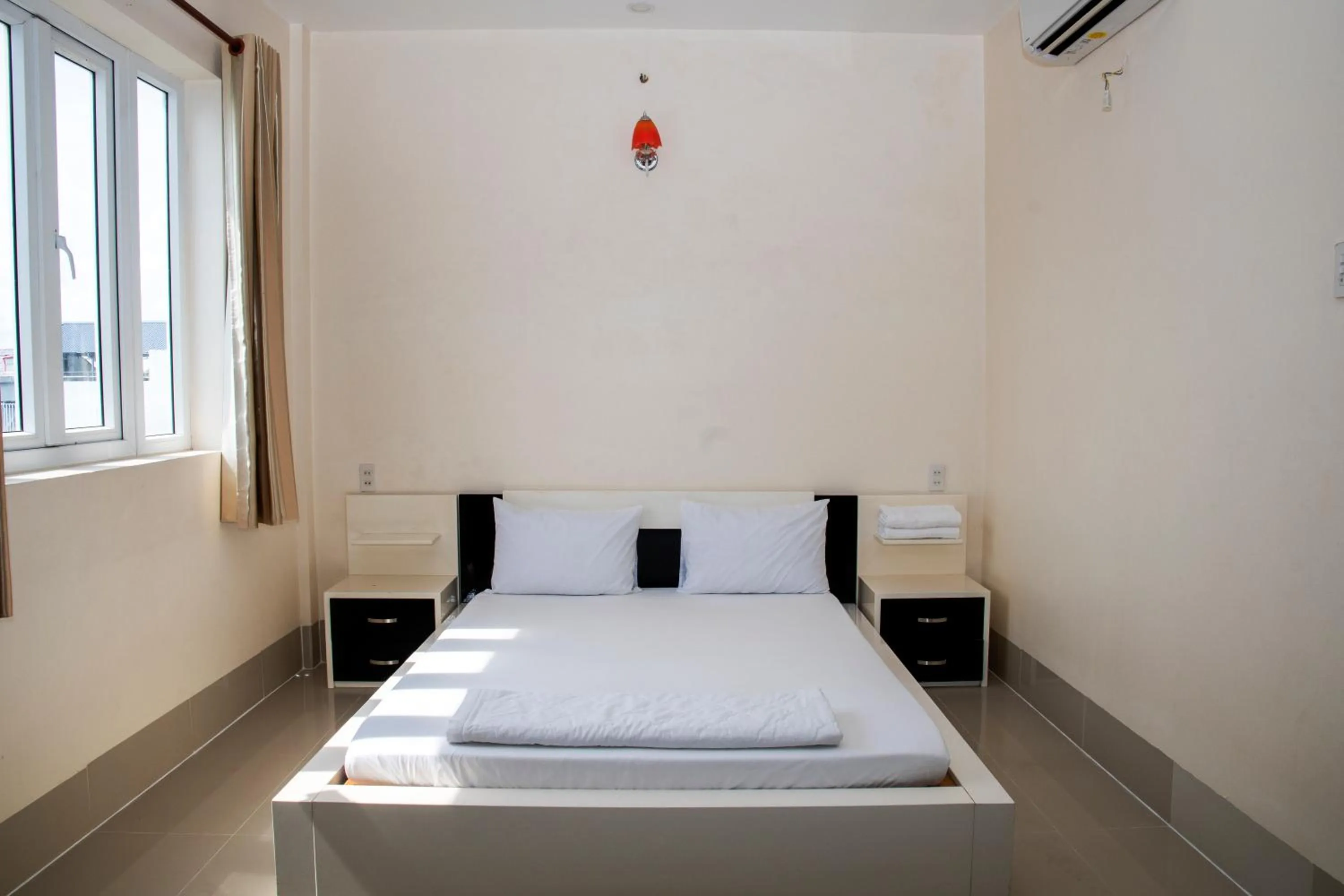 Bed in Sao Mai An Giang Hotel