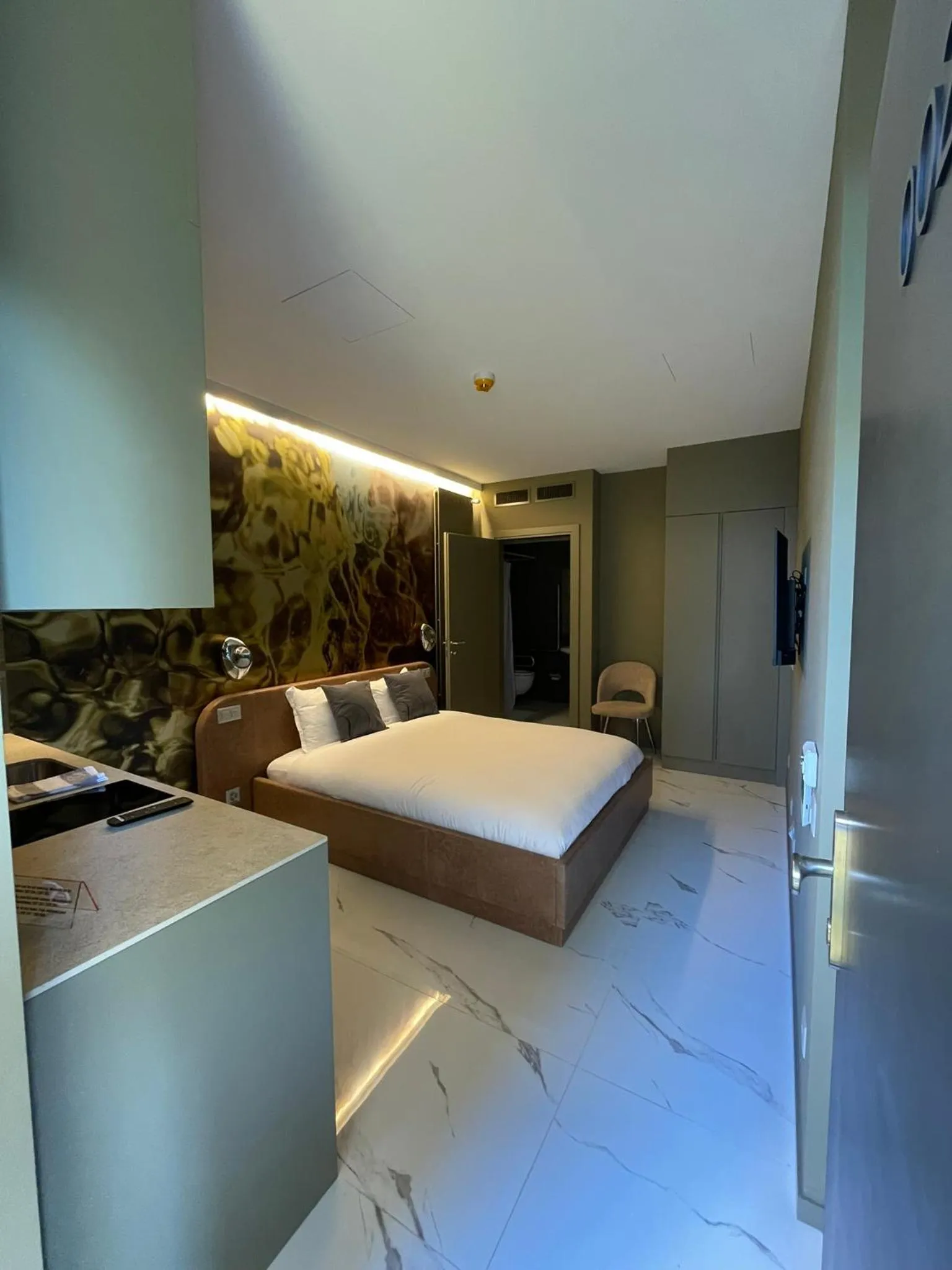 Bed in VISIONAPARTMENTS Lugano - contactless check-in