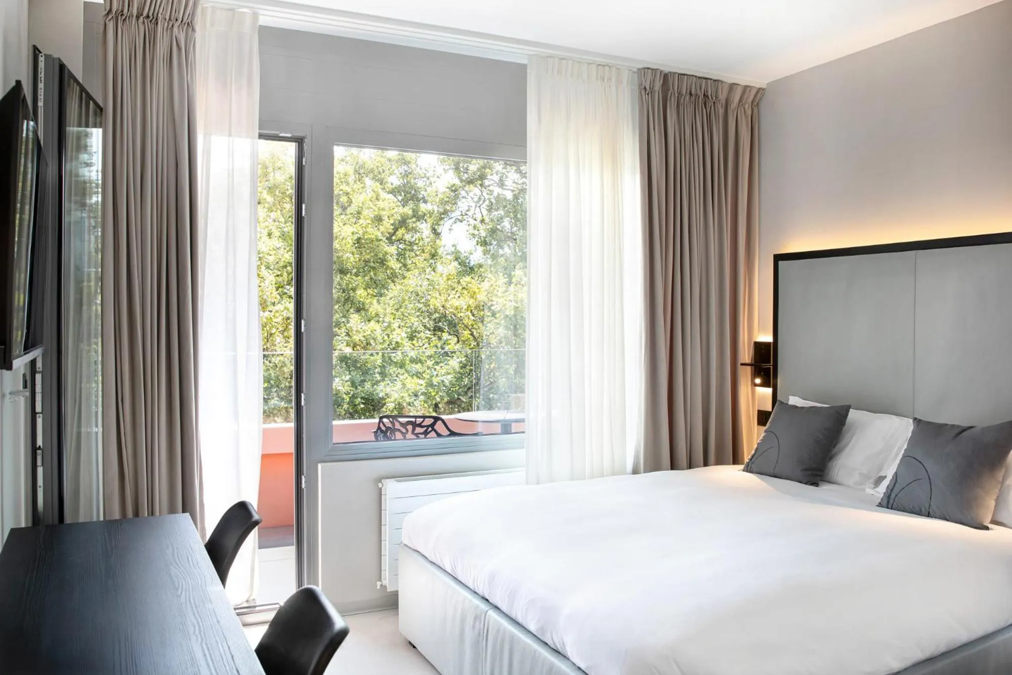 Bed in VISIONAPARTMENTS Lugano - contactless check-in