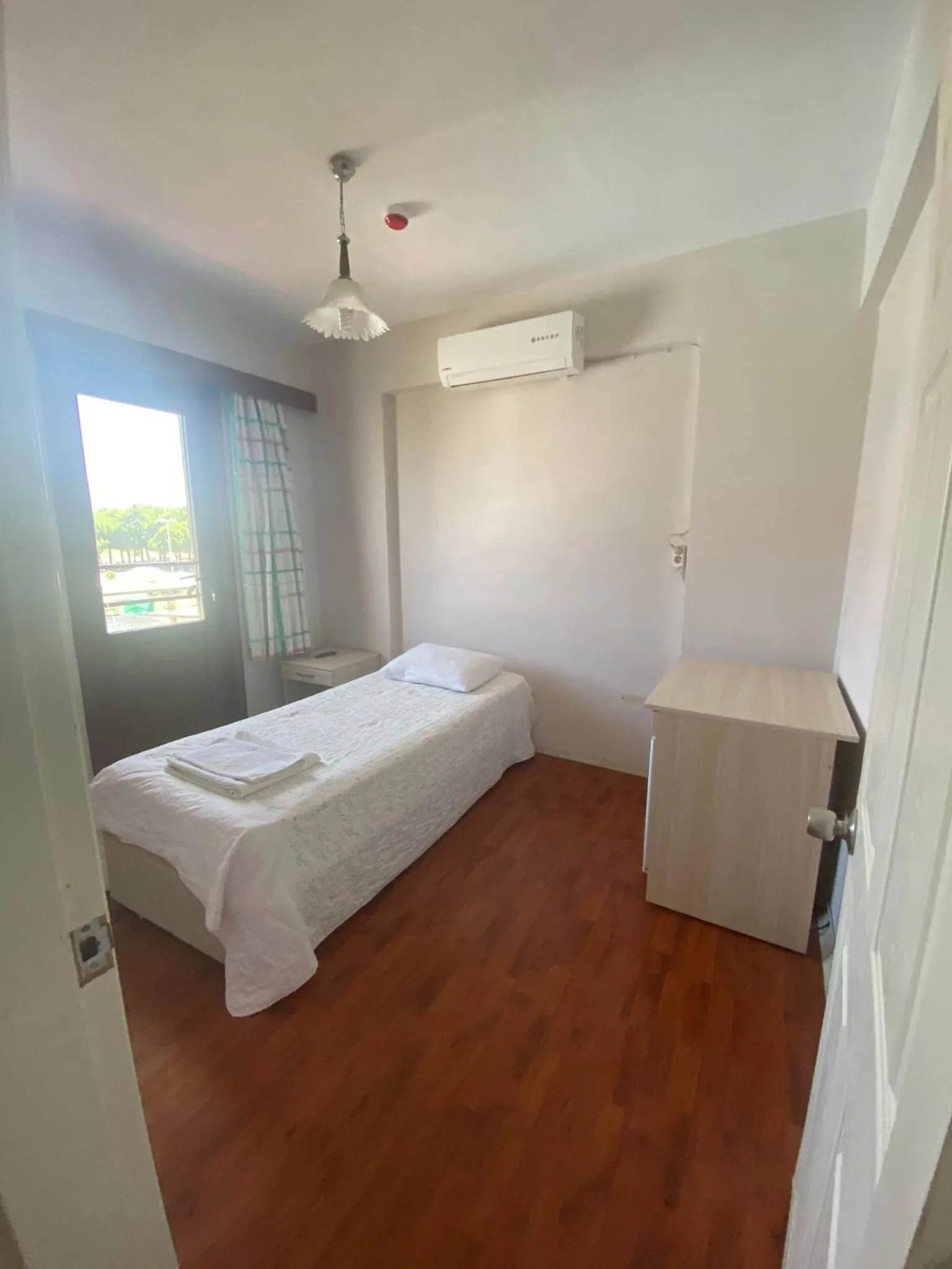 Bed in Kalanora Resort Hotel