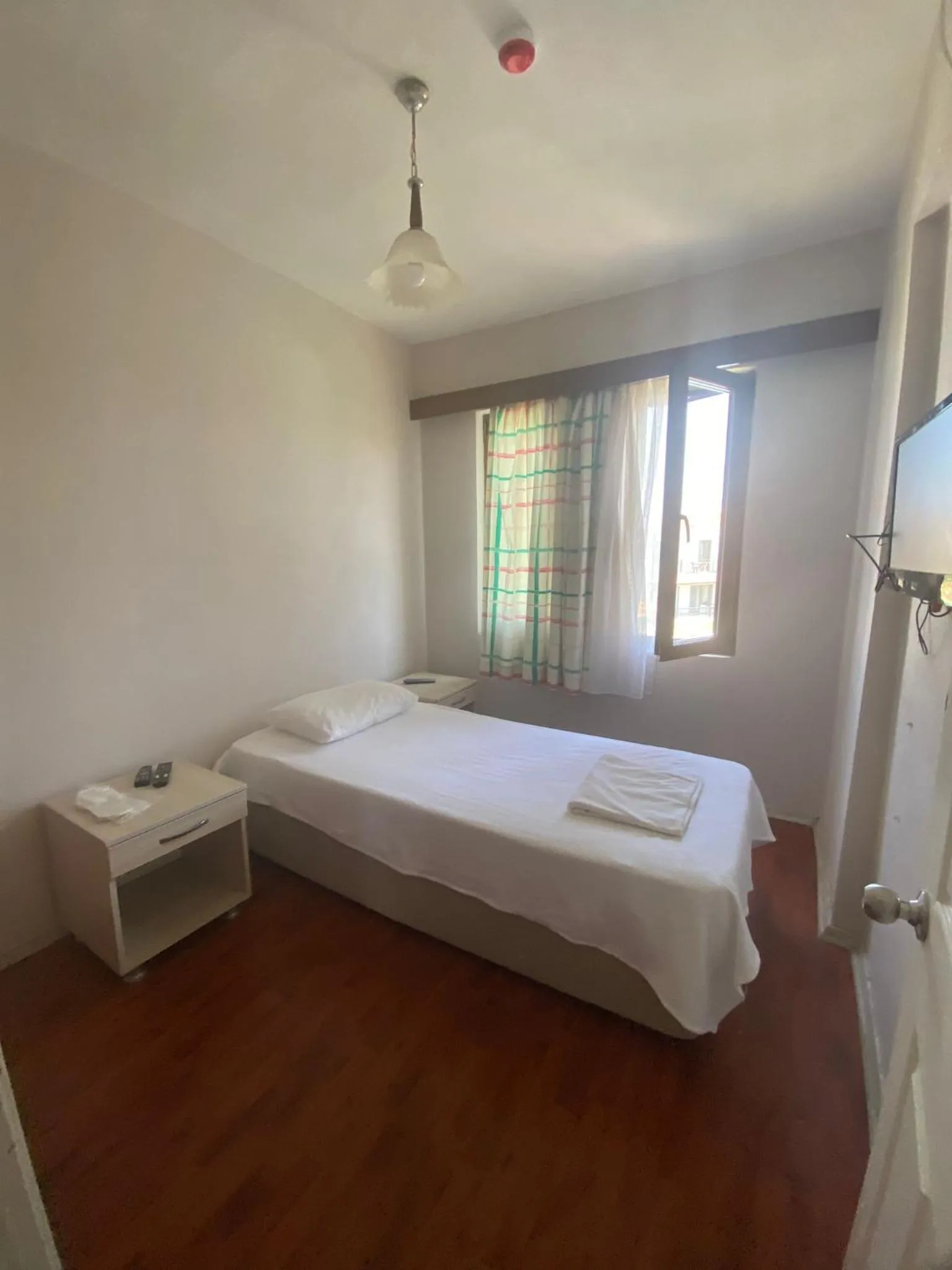 Bed in Kalanora Resort Hotel