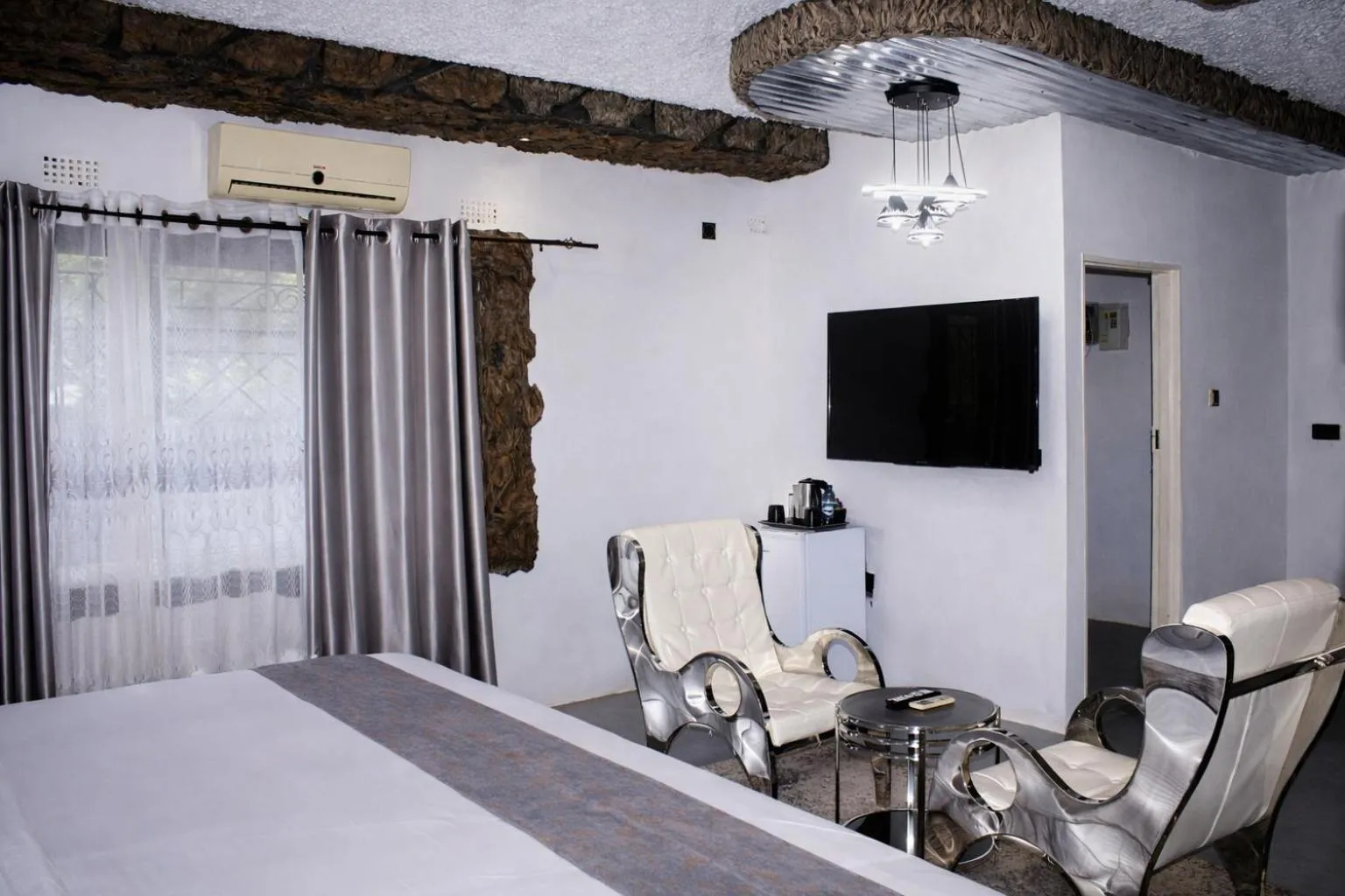 Bed in Rustiek Hotel