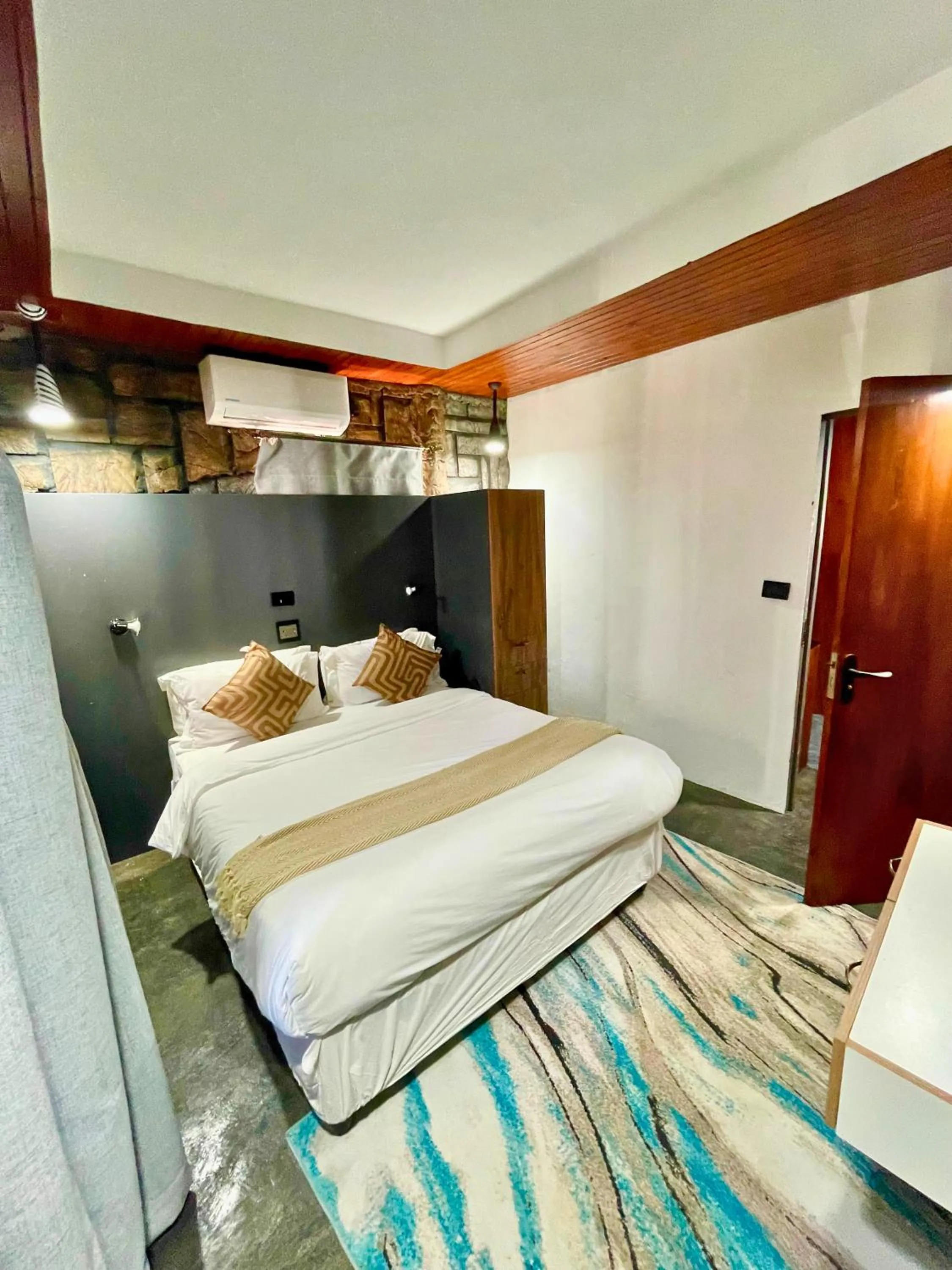 Bedroom in Rustiek Hotel