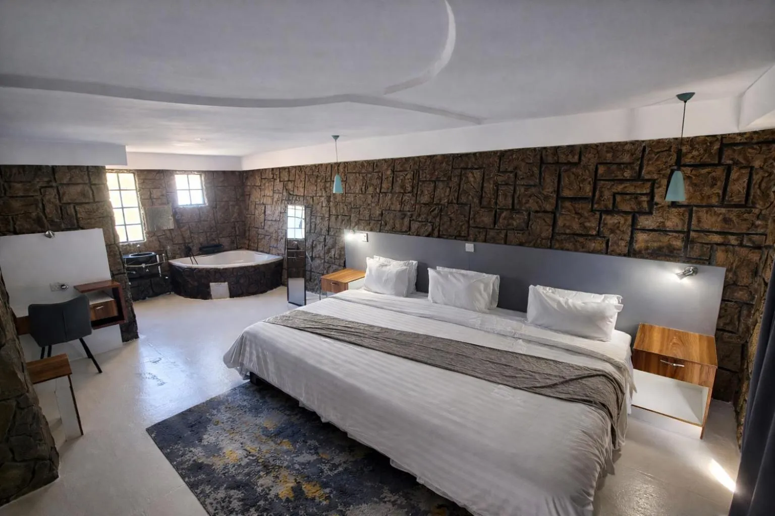 Bed in Rustiek Hotel