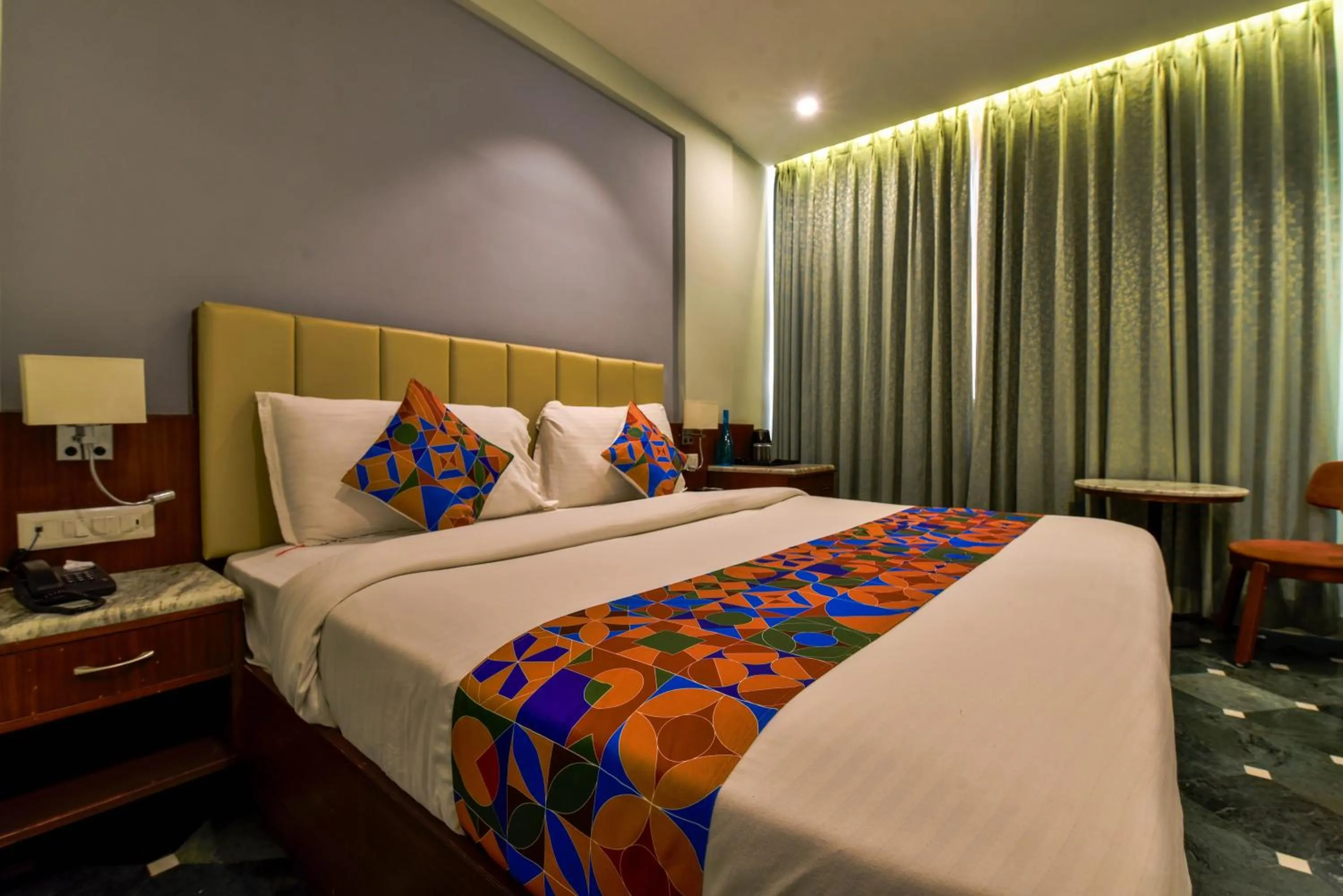 Bed in Naivara Boutique Hotel