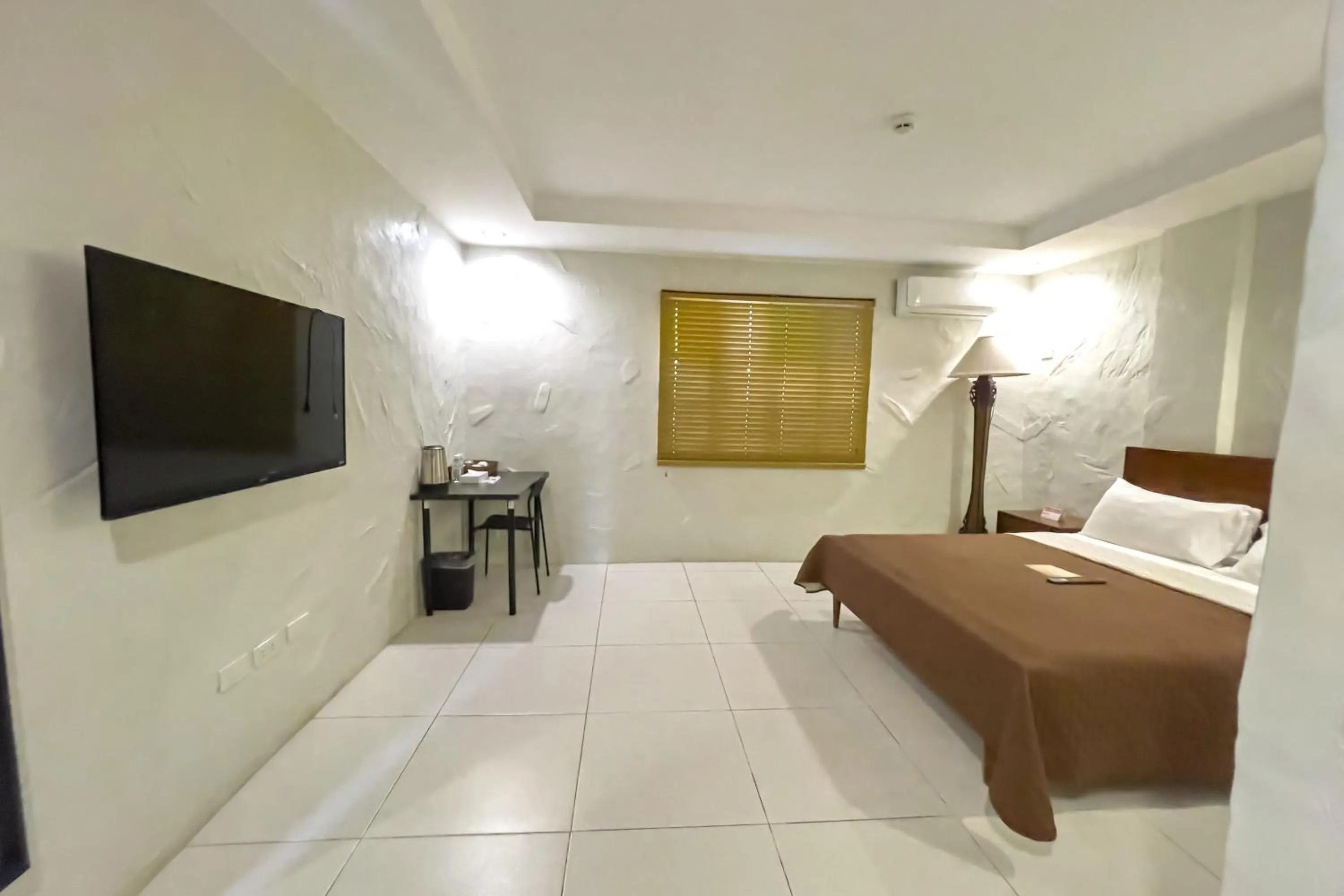 Bed in Laurel Heritage Resort and Spa