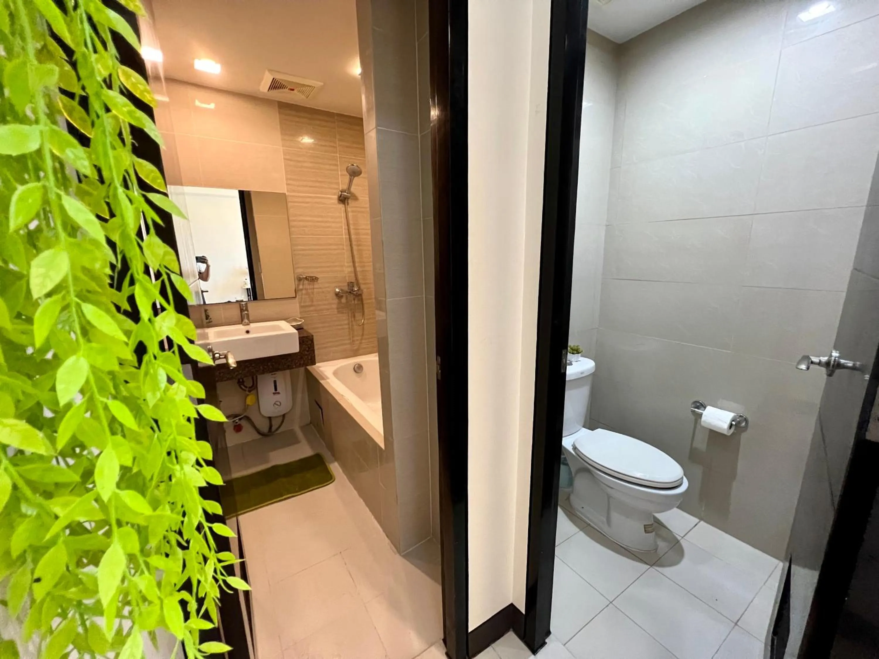 Shower in Mactan Newtown A by Isla Stays