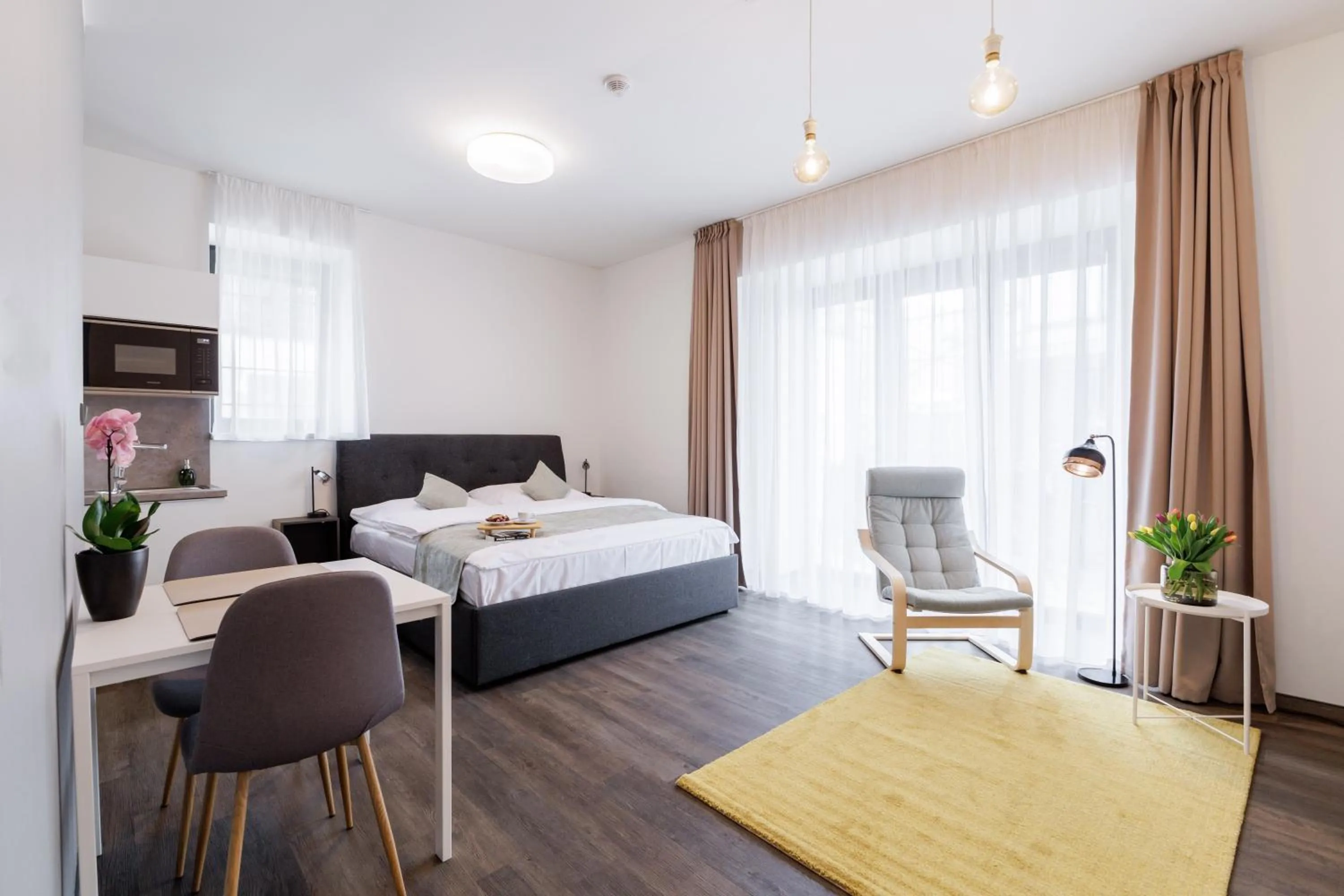 Bed in River Apartments