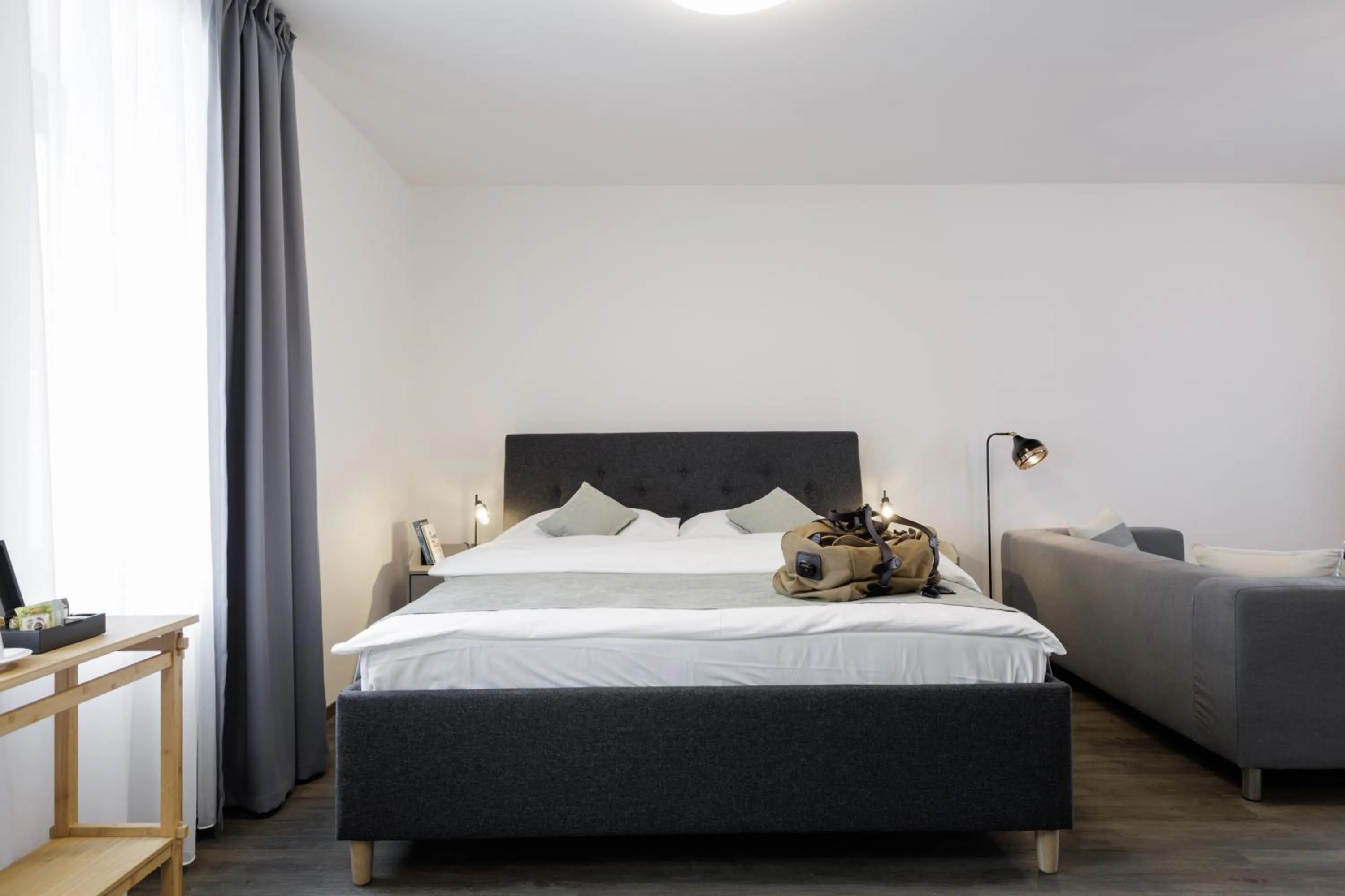 Bed in River Apartments