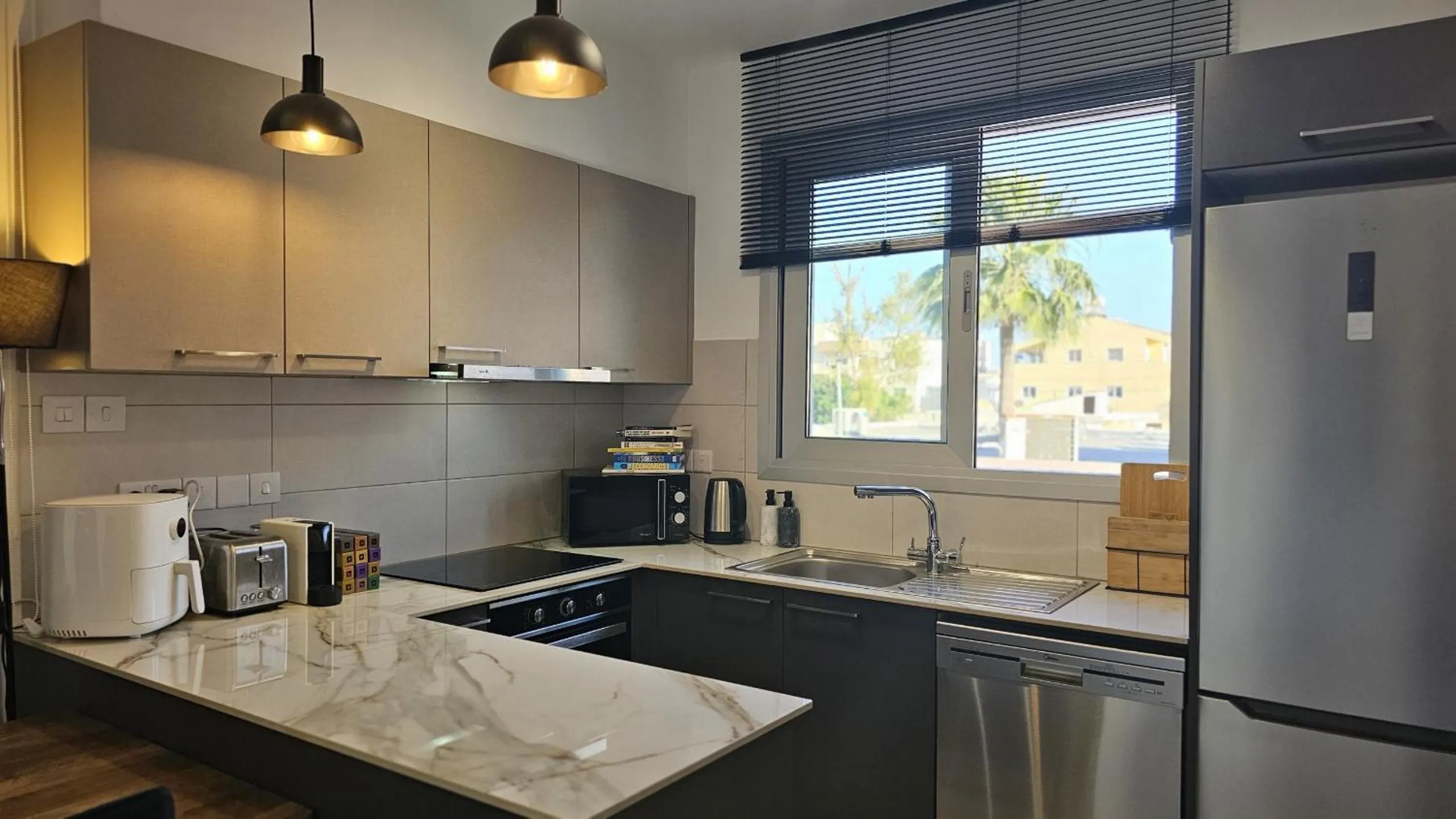 Kitchen or kitchenette in STAY Digital Den Apartment