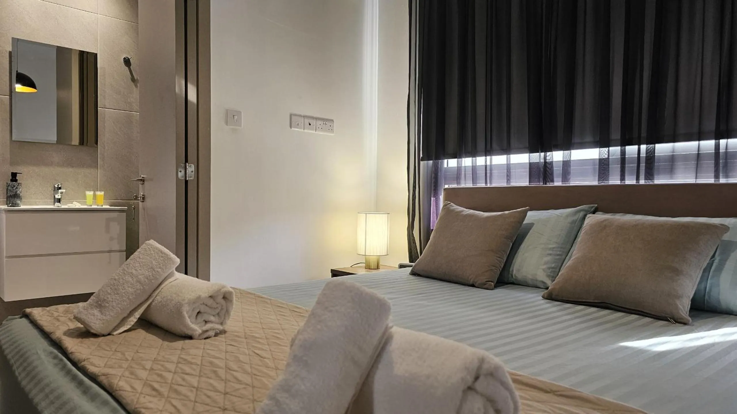 Bed in STAY Digital Den Apartment