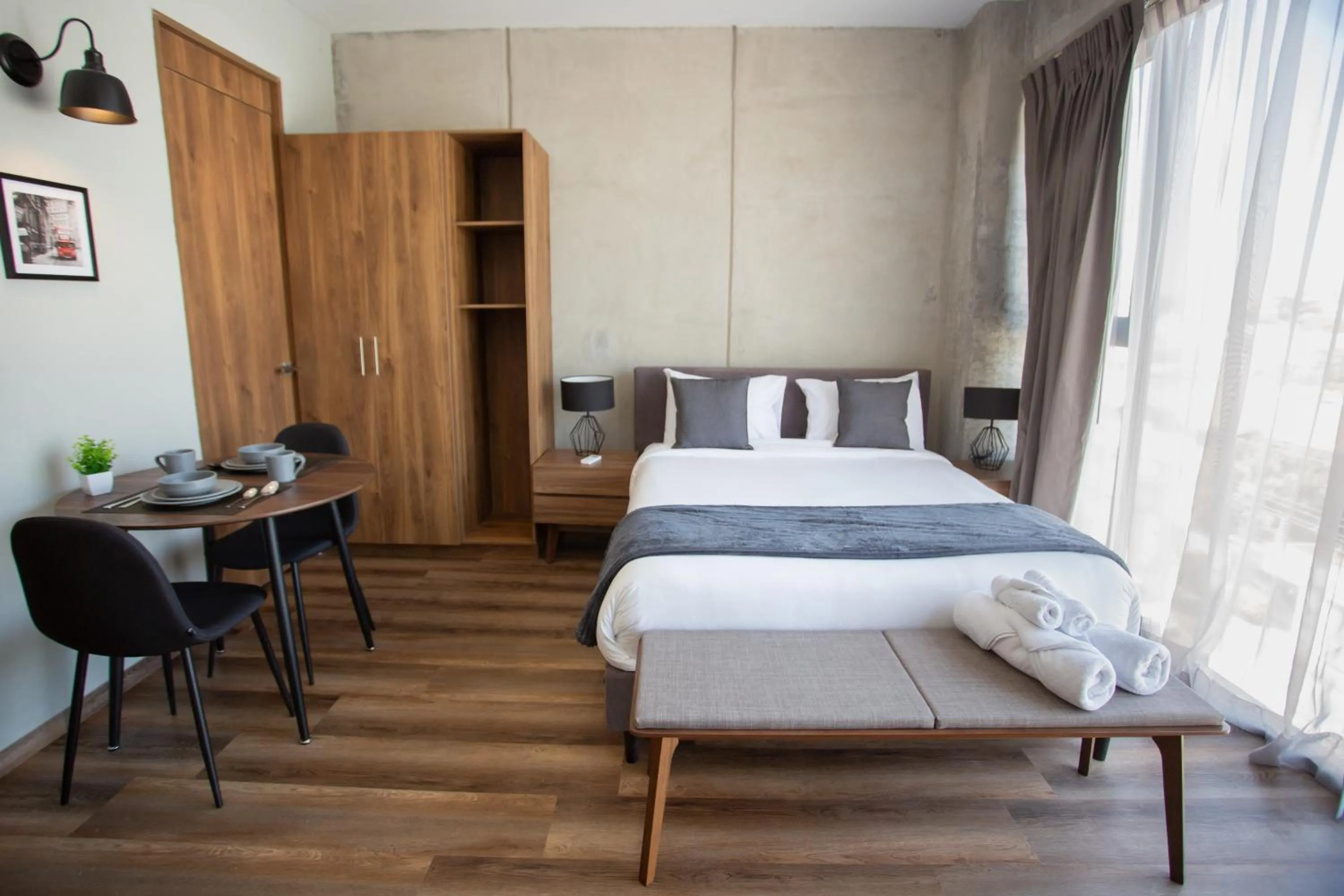 Bed in Suites del Carmen Consulado