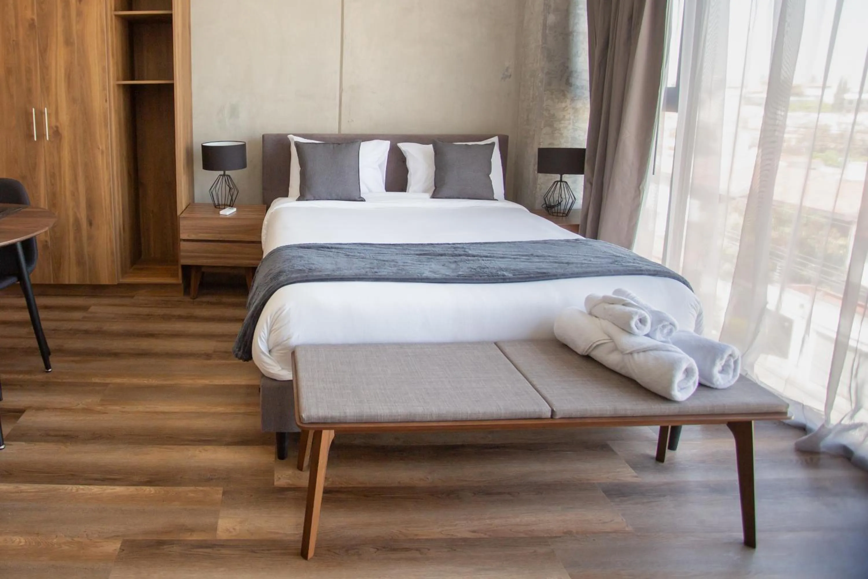 Bed in Suites del Carmen Consulado