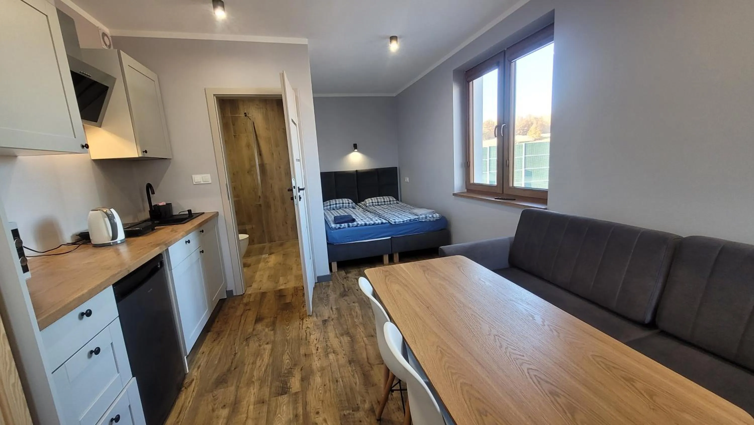 Wrzosowe Wzgórze 5 - Studia i Apartamenty