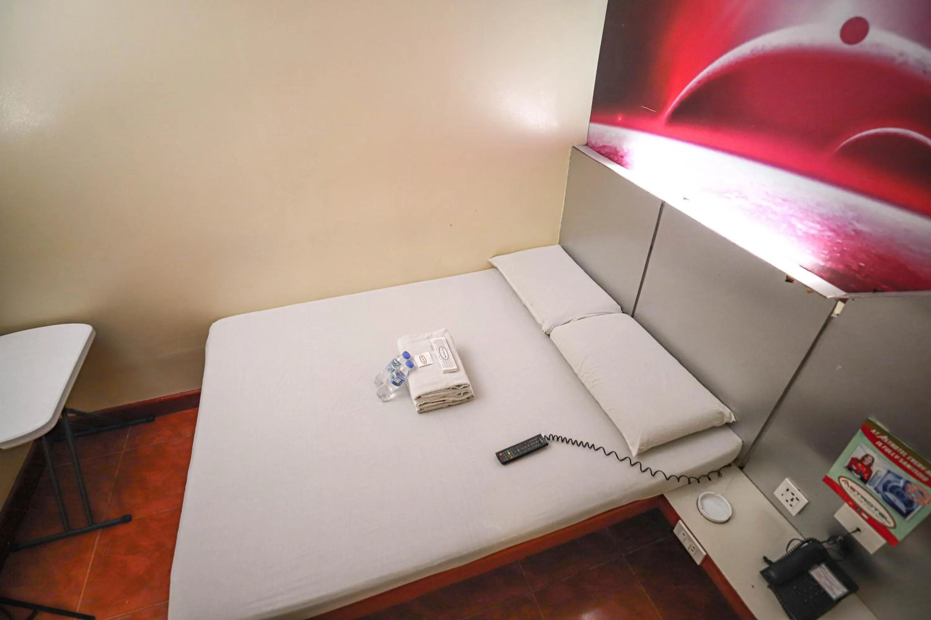 Bed in Astrotel Cubao