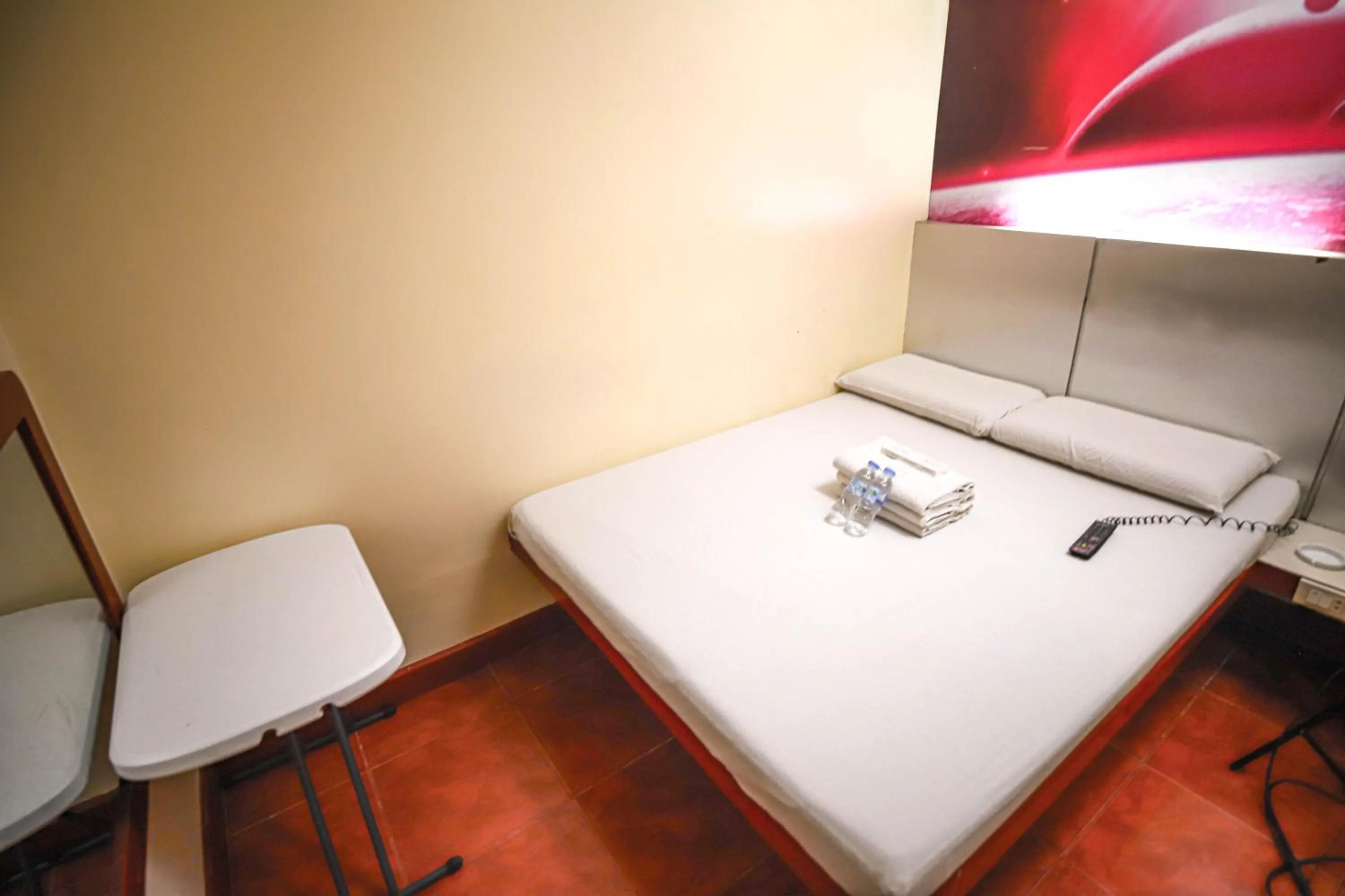 Bed in Astrotel Cubao