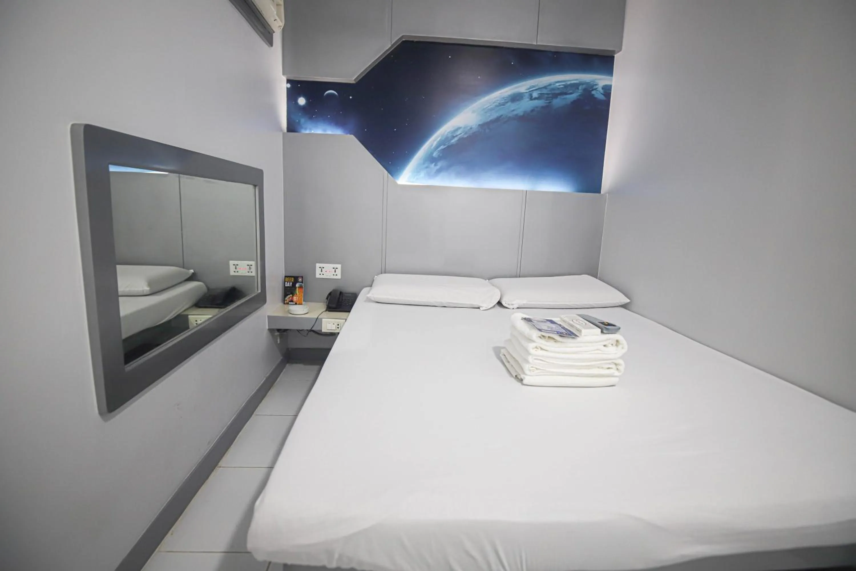 Bed in Astrotel Calamba