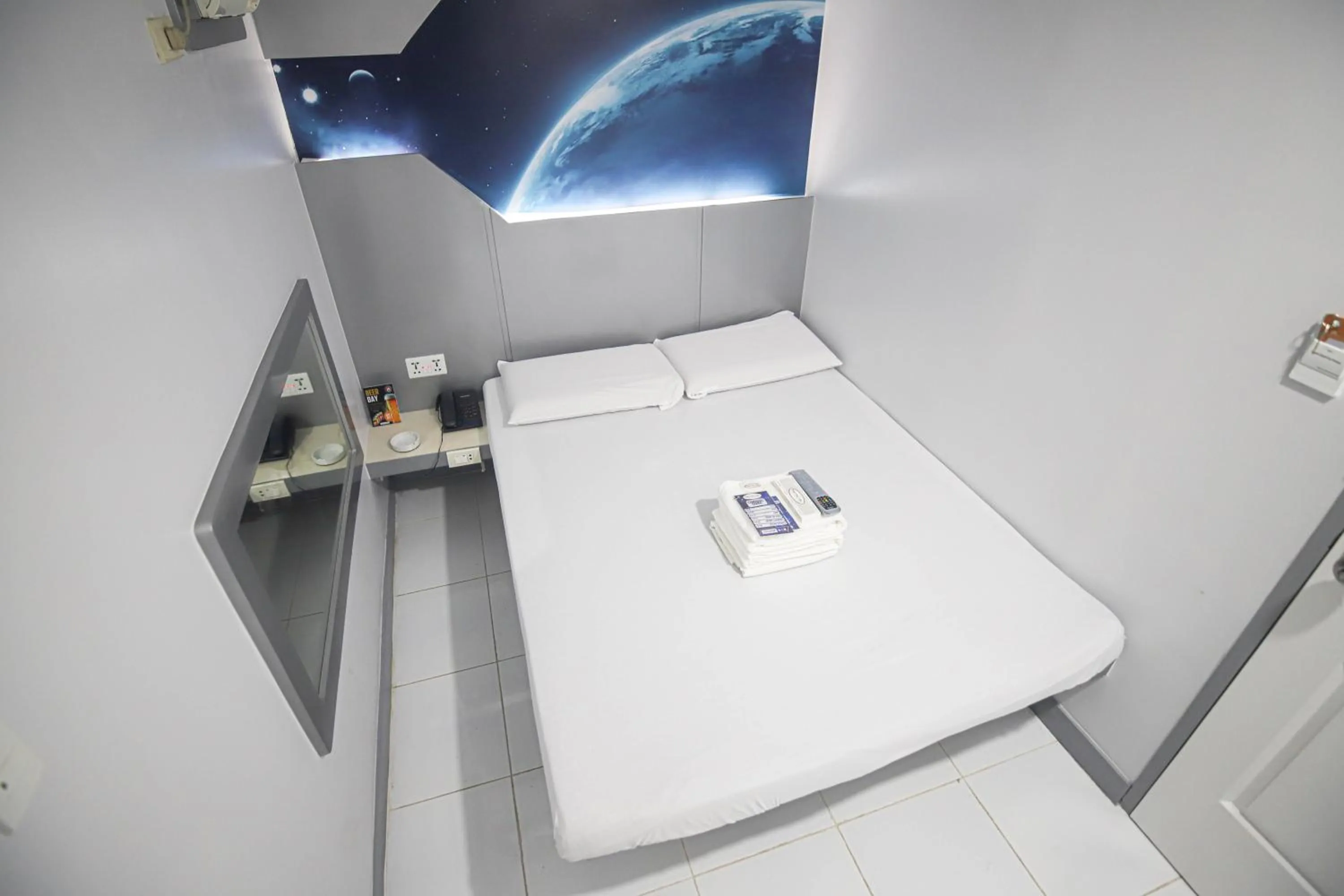 Bed in Astrotel Calamba