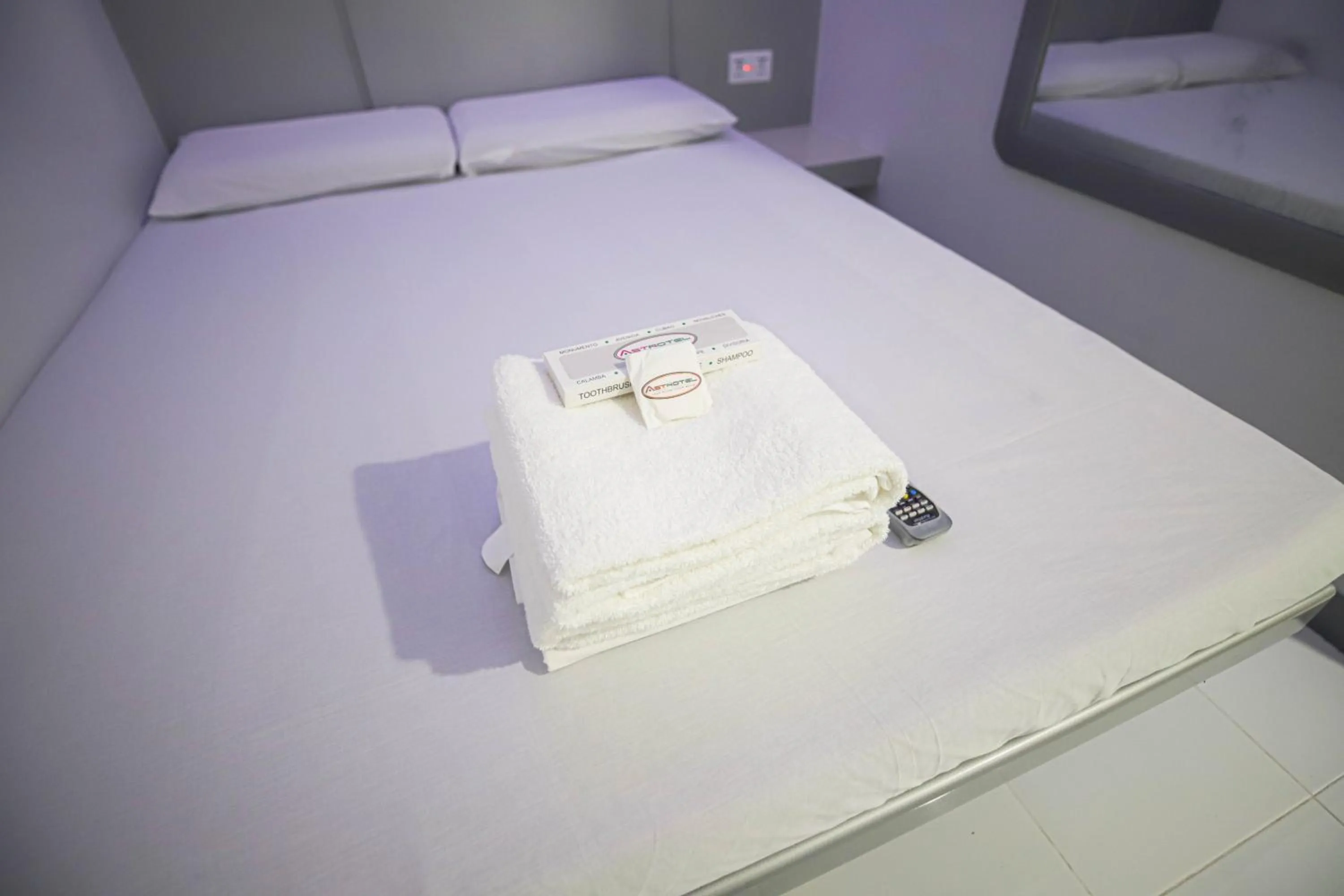 Bed in Astrotel Calamba