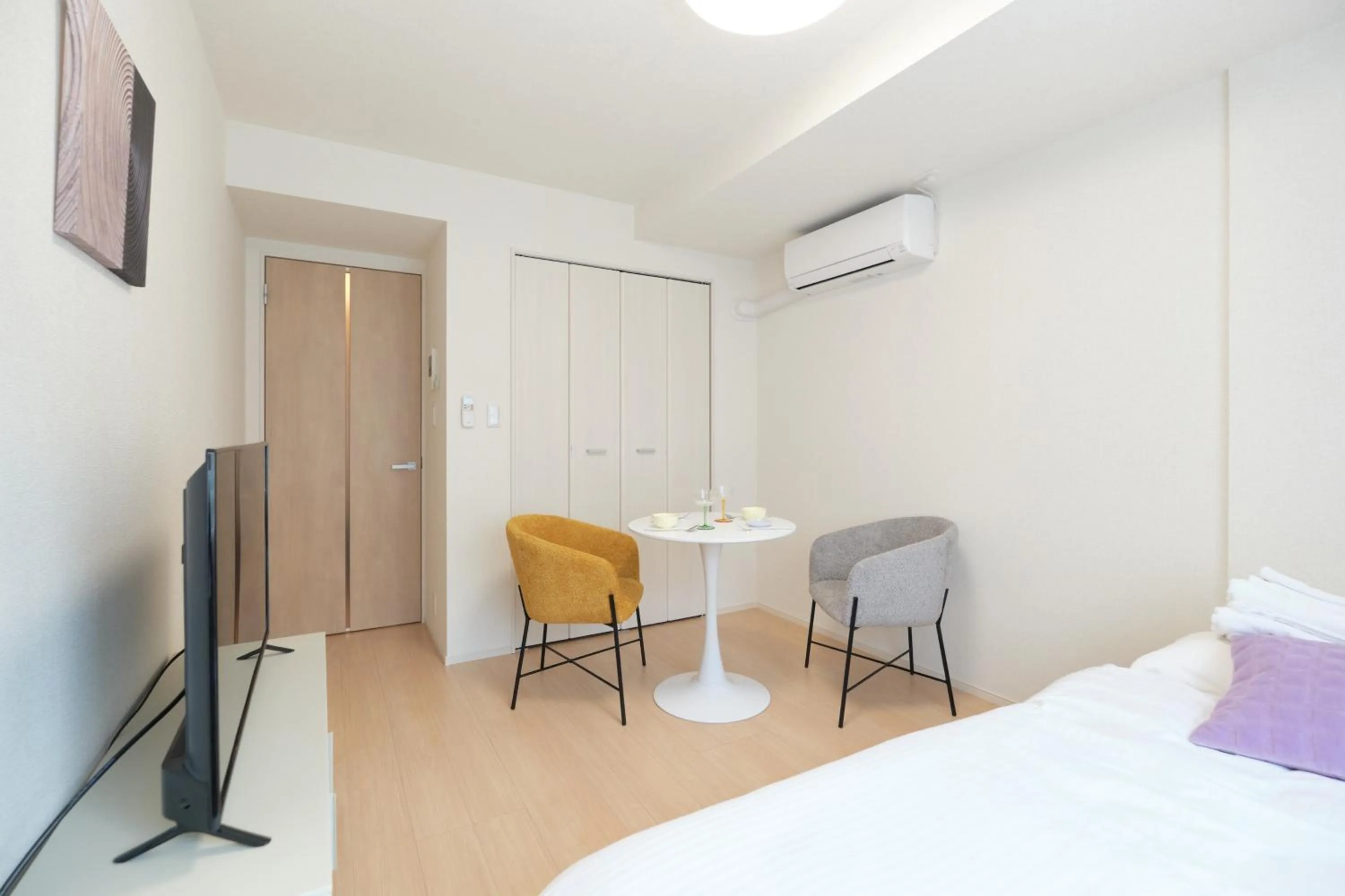 Bed in J-ARC Akebonobashi by Tranova