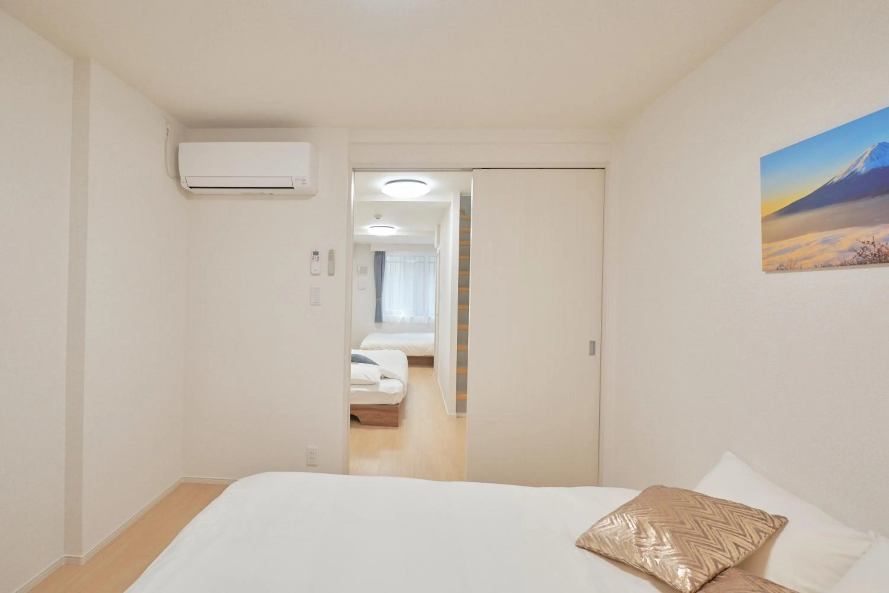 Bed in J-ARC Akebonobashi by Tranova