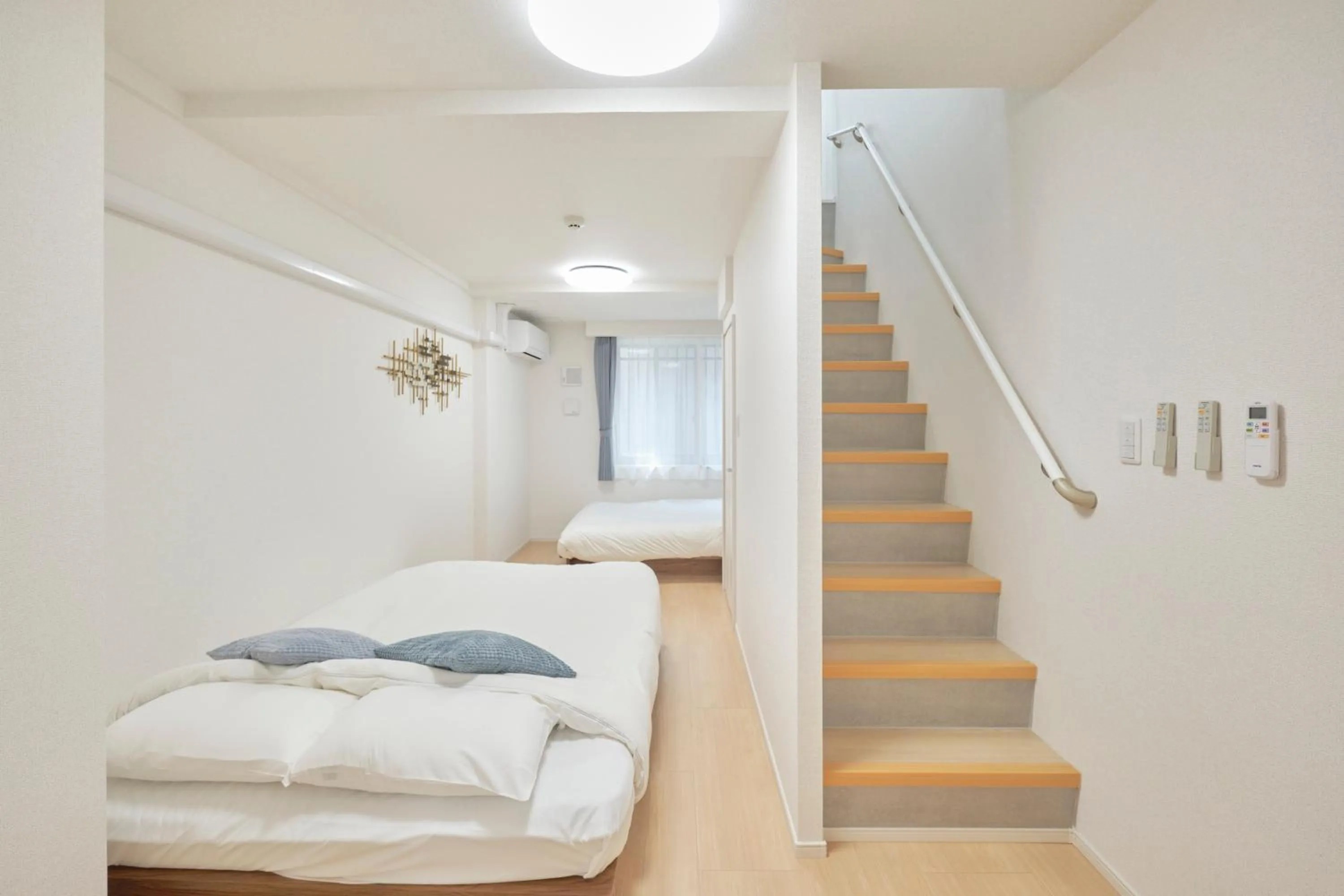 Bed in J-ARC Akebonobashi by Tranova