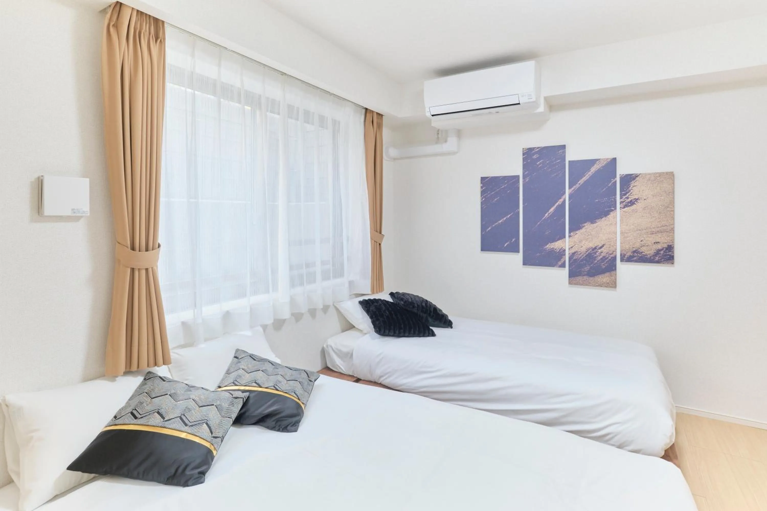 Bed in J-ARC Akebonobashi by Tranova