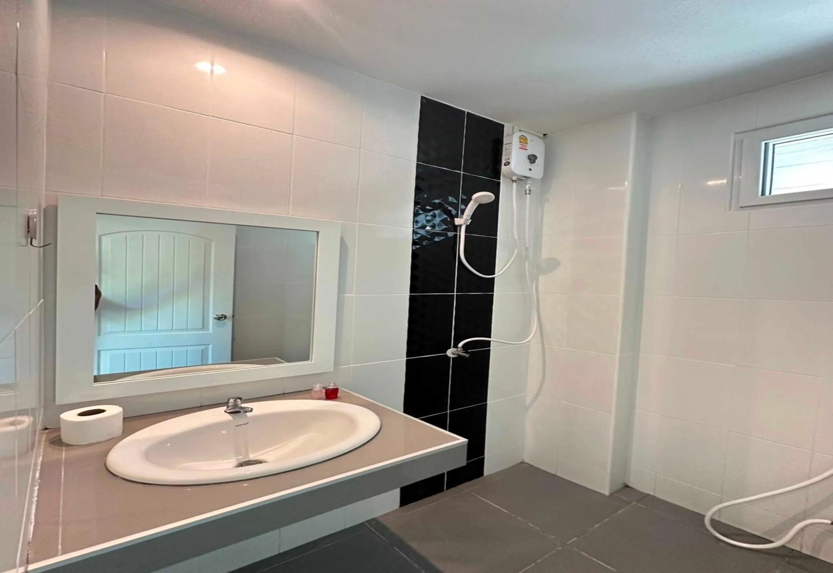 Bathroom in OYO 75492 Carpe Diem Homestay