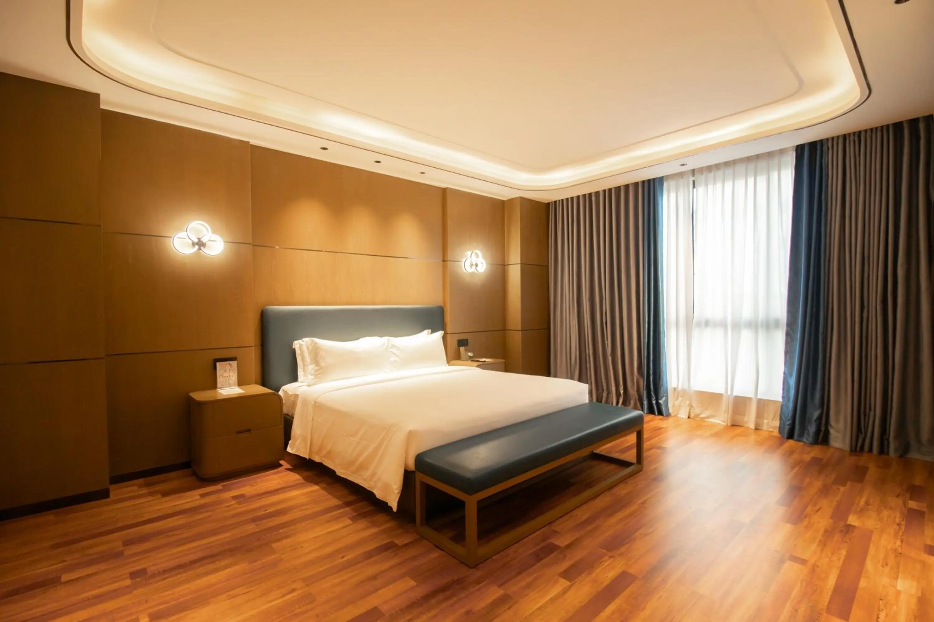Photo of the whole room, Bed in DongHu Resort Hotel