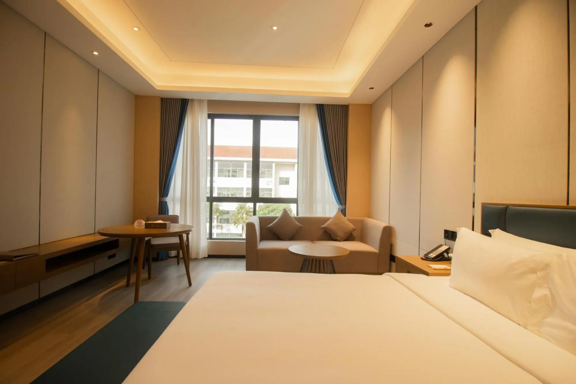 Photo of the whole room, Bed in DongHu Resort Hotel