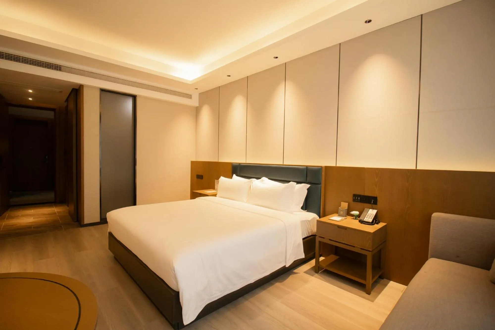 Living room, Bed in DongHu Resort Hotel